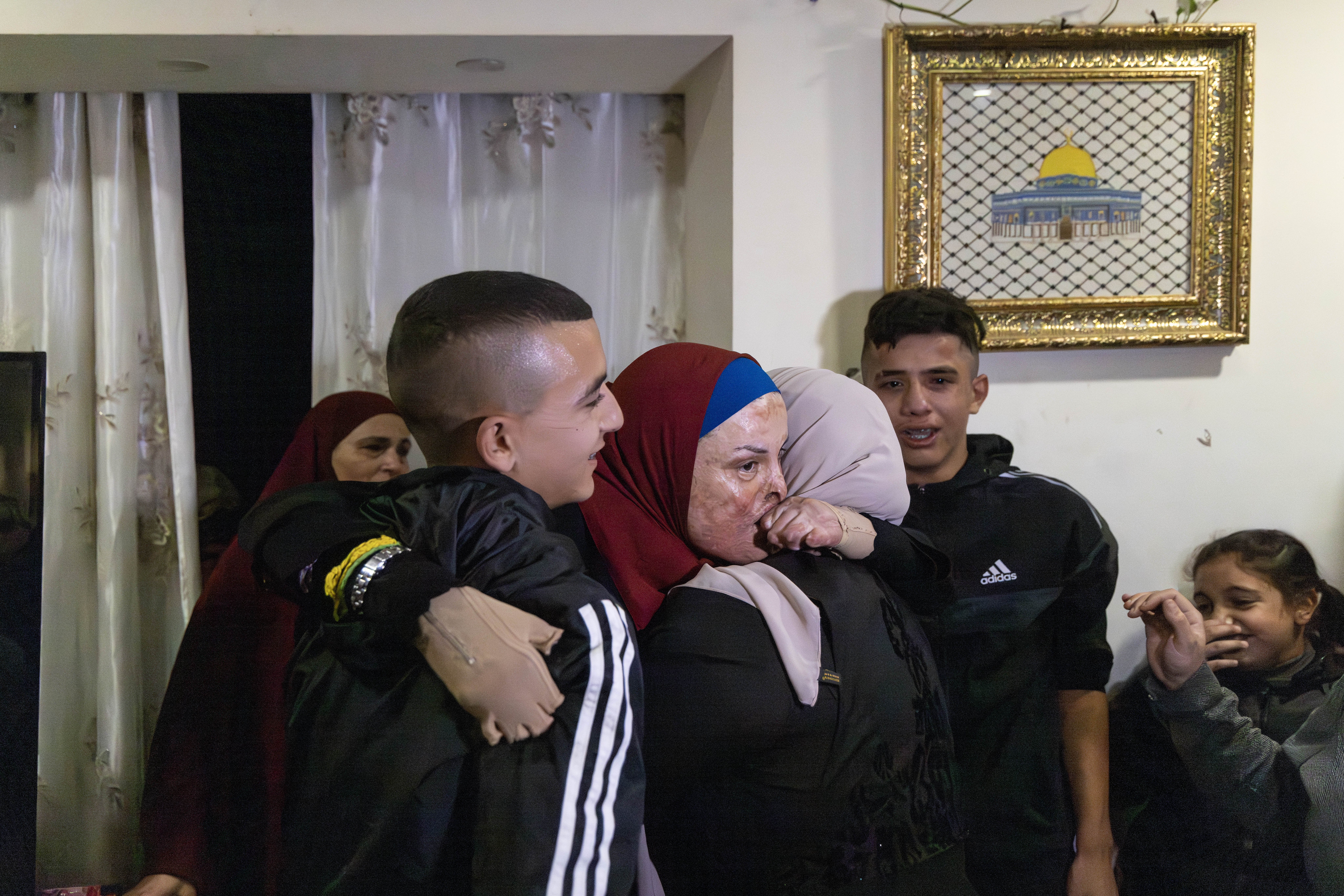 The moment Israa met her son and mother