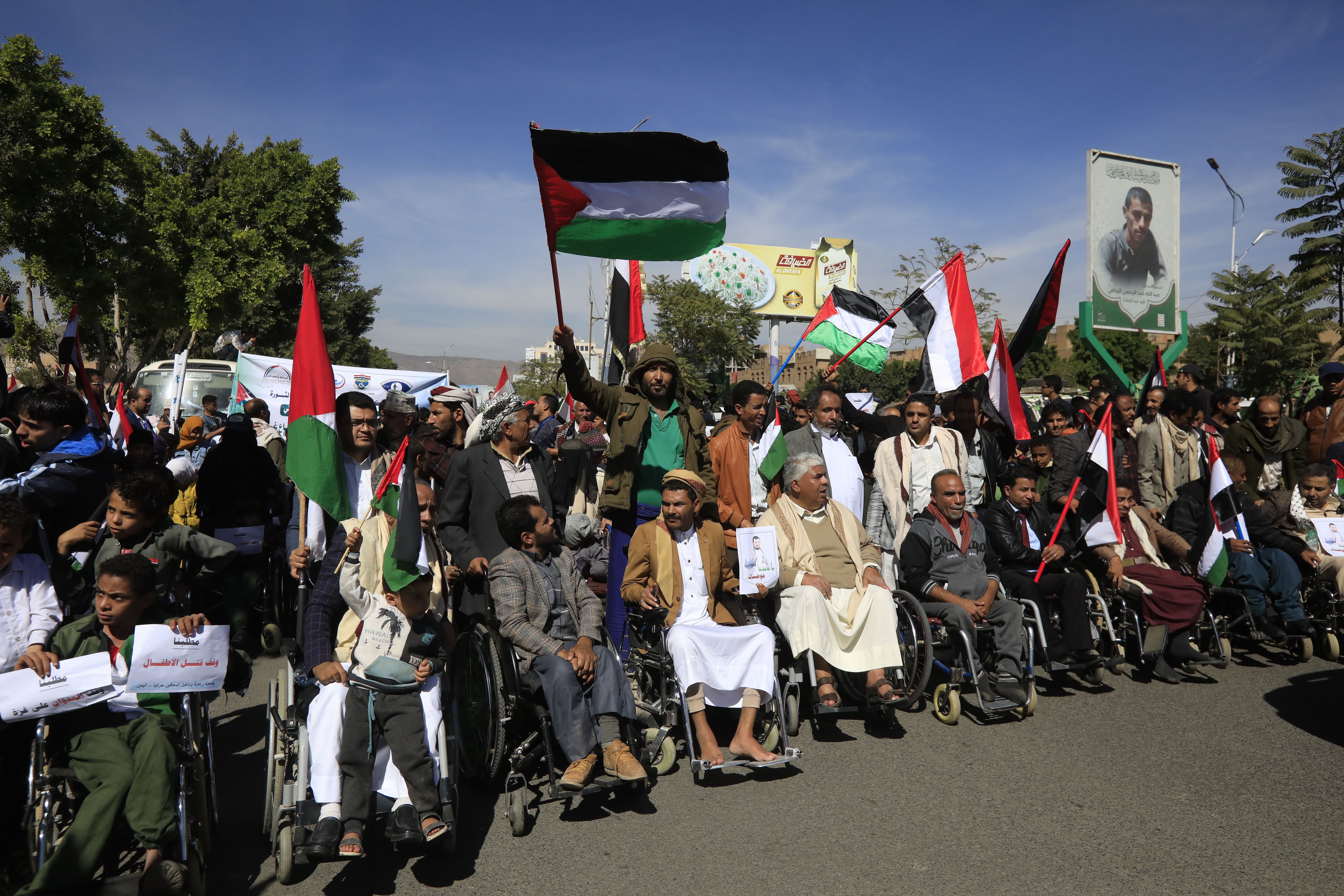 People with disabilities participate in a rally against the Israeli bombardment of the Gaza Strip, outside the UN offices in Sana'a, Yemen.