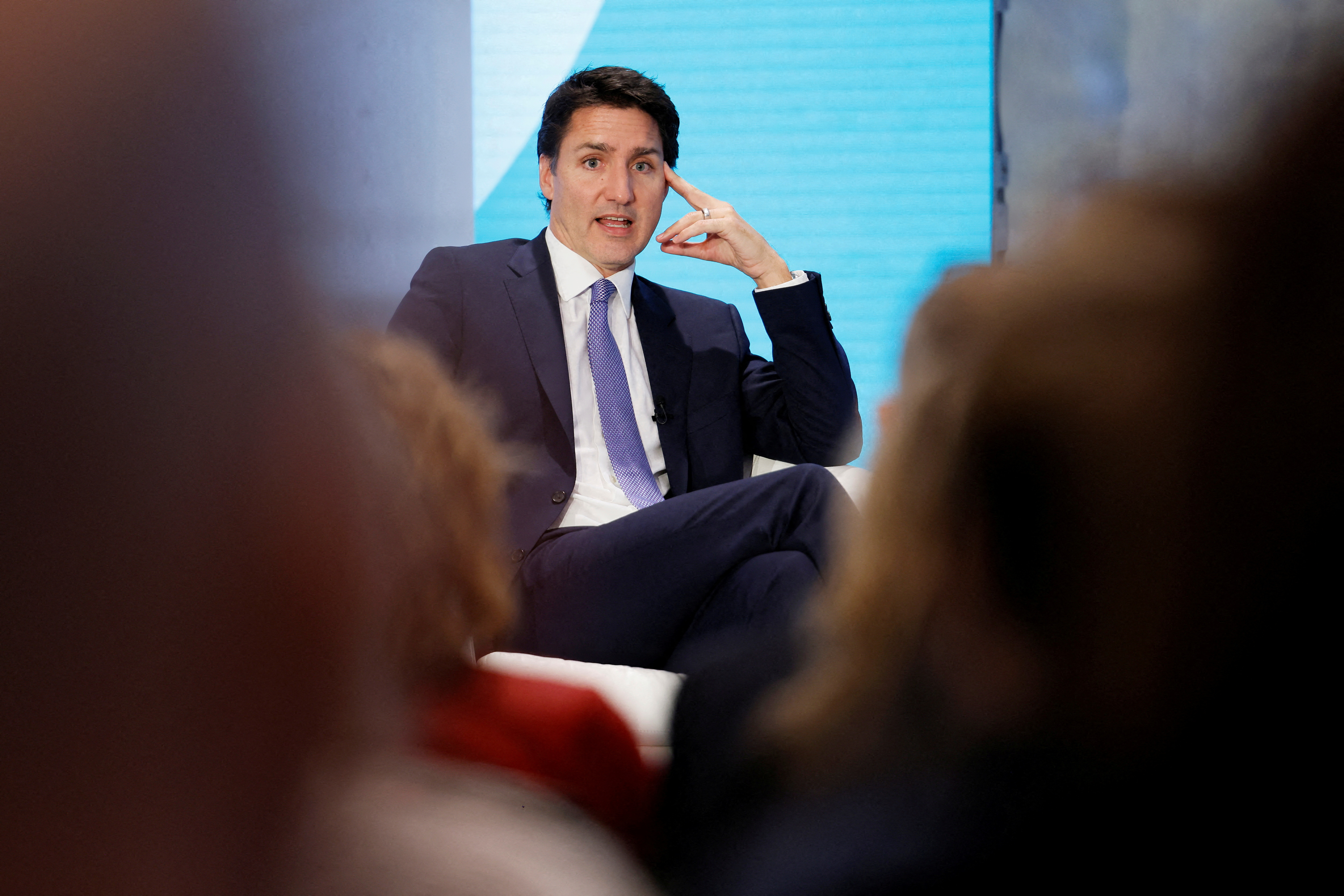 Canadian Prime Minister Justin Trudeau answers questions during a conference