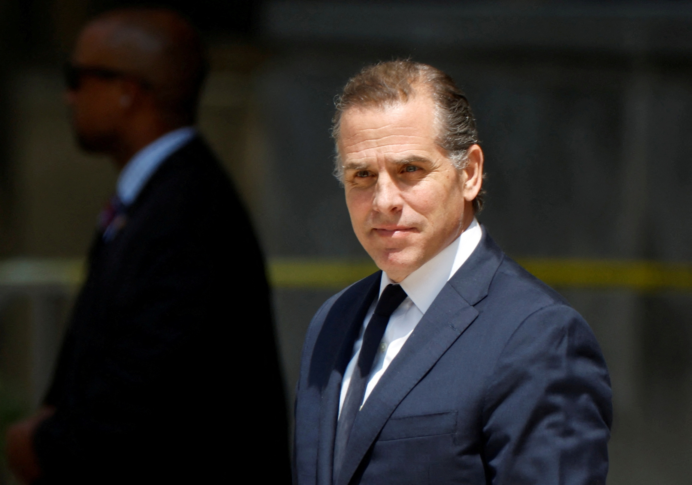 Hunter Biden, son of U.S. President Joe Biden, departs federal court after a plea hearing on two misdemeanor charges of willfully failing to pay income taxes in Wilmington, Delaware.