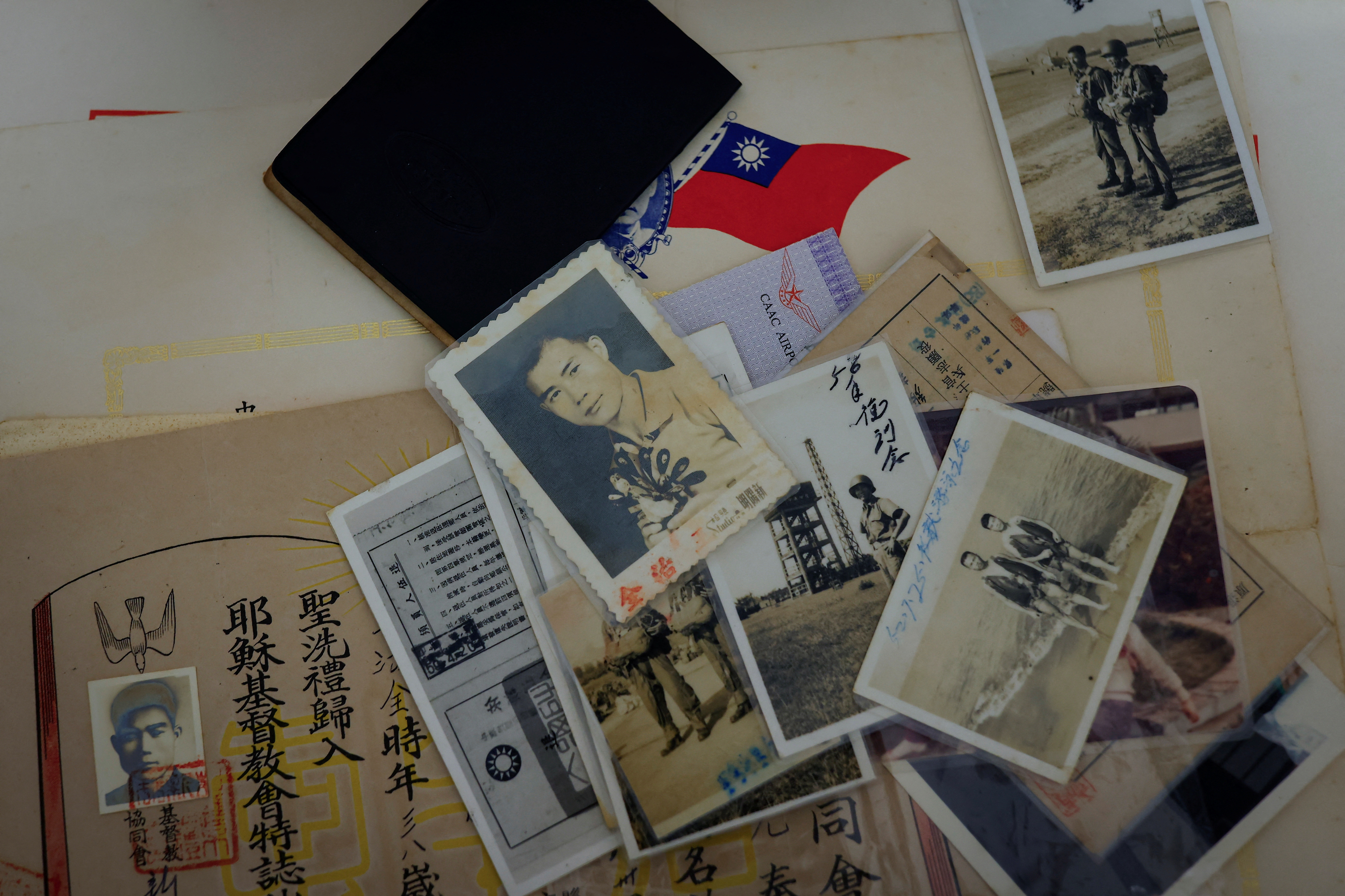 Old photos belonging to Wang Chih-chuan, 93, and displayed for the camera, can be seen in his room at Taoyuan Veterans Home in Taoyuan, Taiwan.