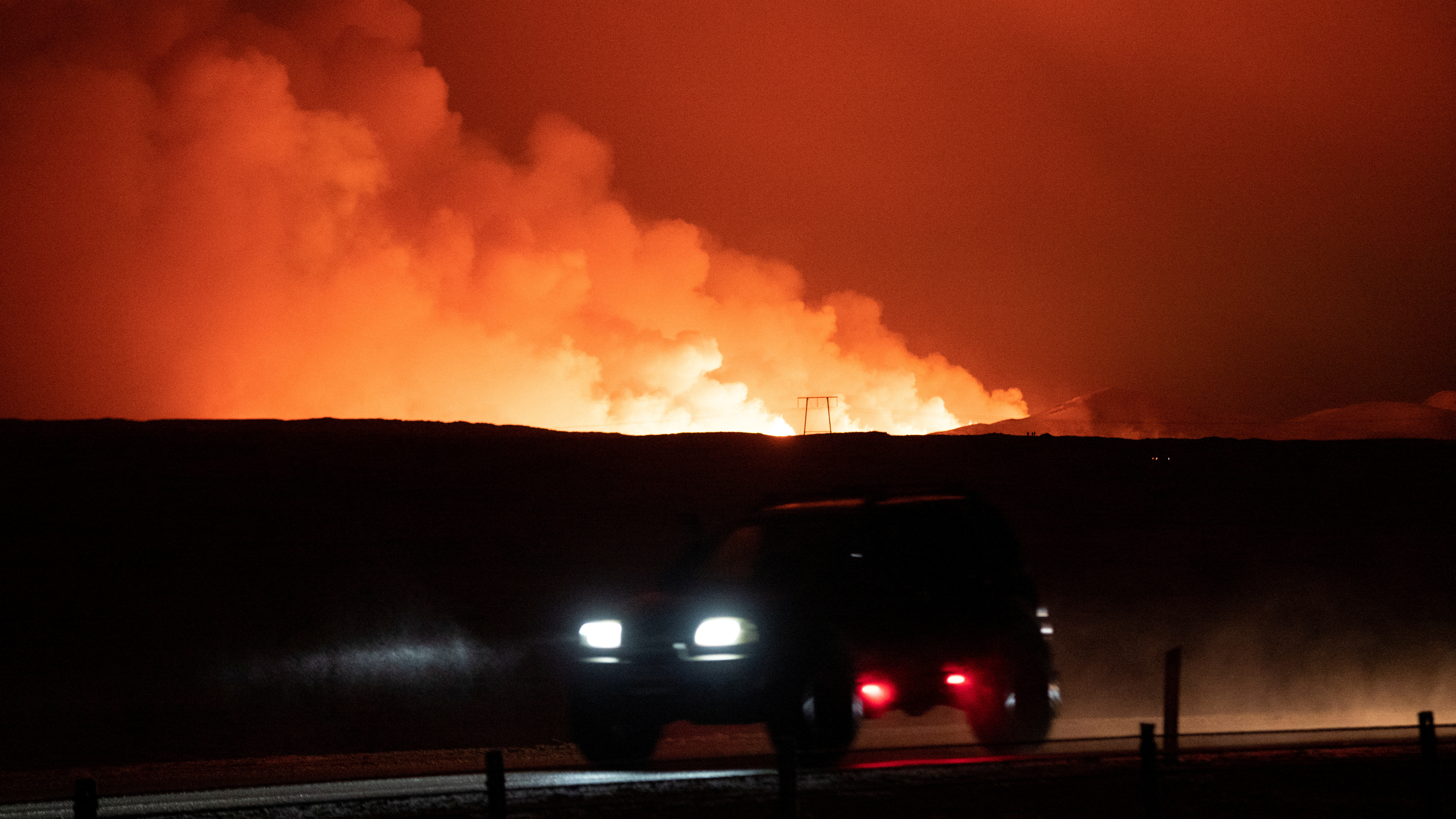 A volcano spews lava and smoke as it erupts in Grindavik, Iceland