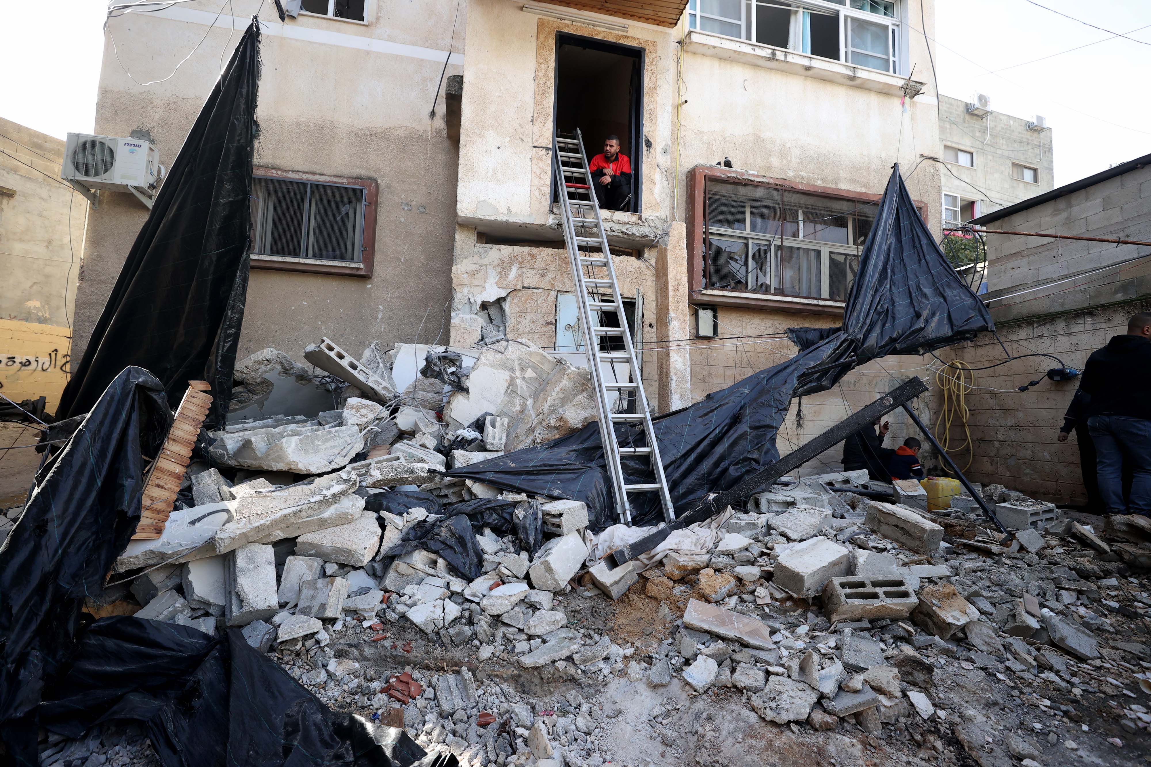 A view of destruction after 6 Palestinians killed in an Israeli attack carried out using unmanned aerial vehicles (UAV) targeting the Nour Shams refugee camp in Tulkarm, West Bank on December 17