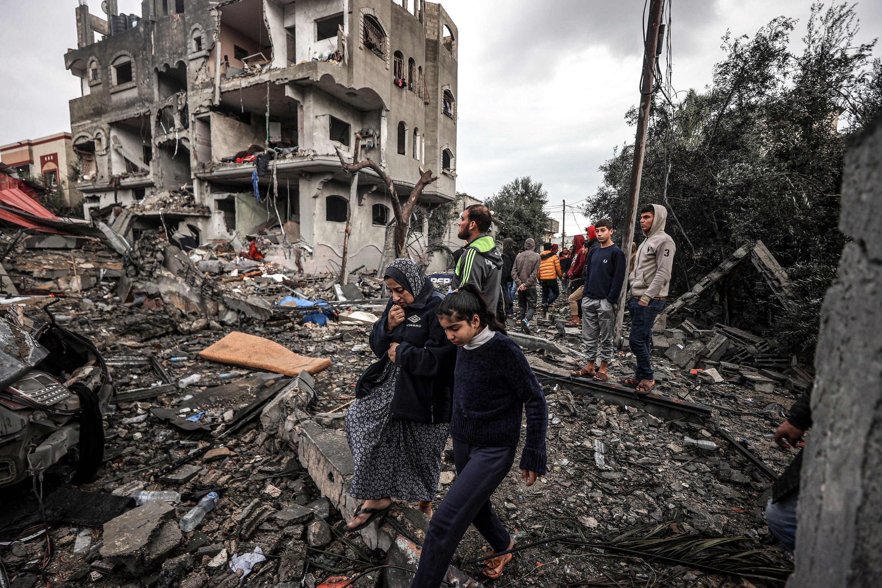 Search and rescue efforts for those trapped under rubble continue after Israeli airstrike hit civil residential area in al Maghazi refugee camp, Gaza on December 25
