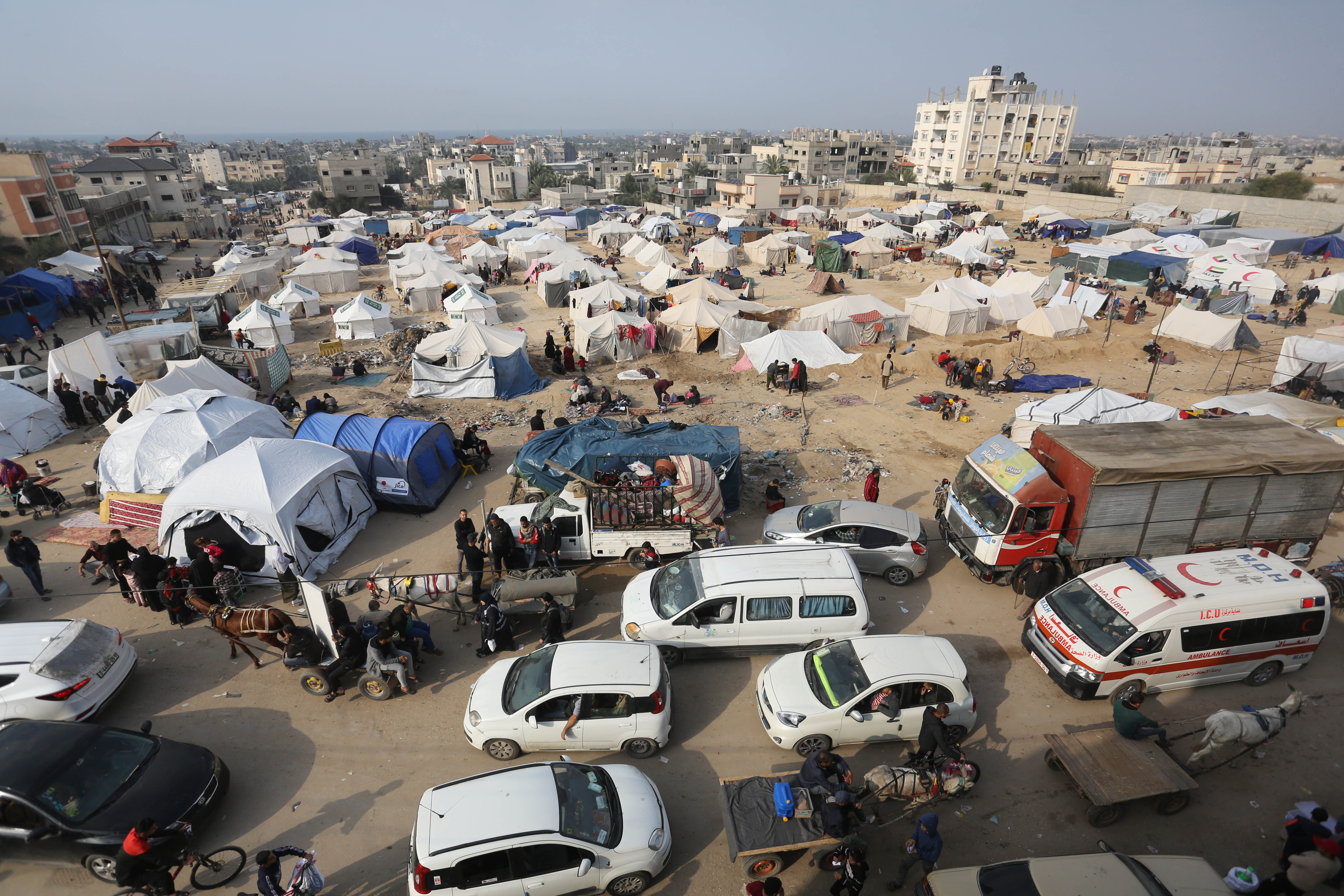 A general view shows Palestinian residents start to live in their makeshift tents after leaving their homes in Bureij Refugee Camp in Deir al Balah, central Gaza.