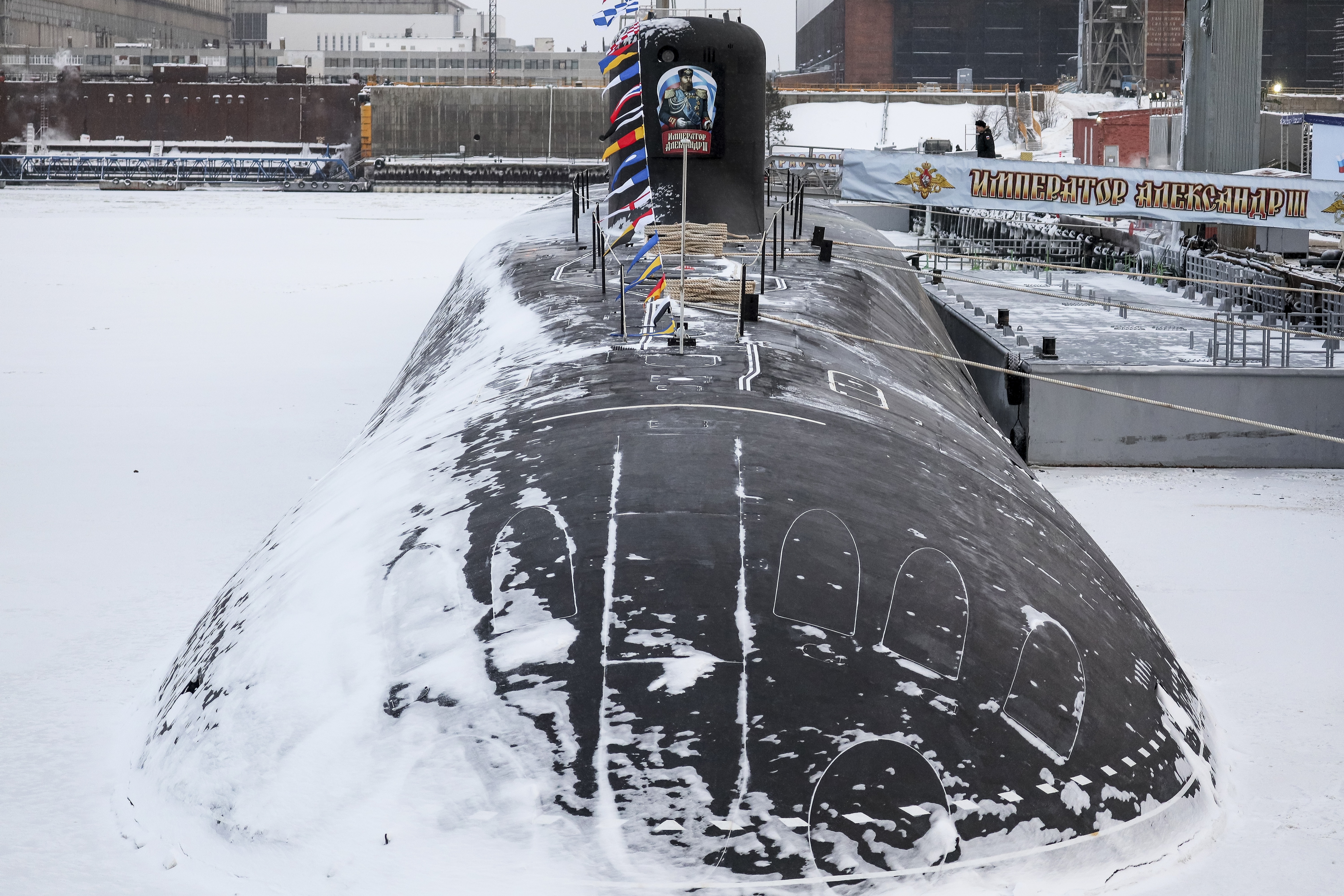 The Emperor Alexander III. It is moored at the quay. The water is frozen and covered in snow.