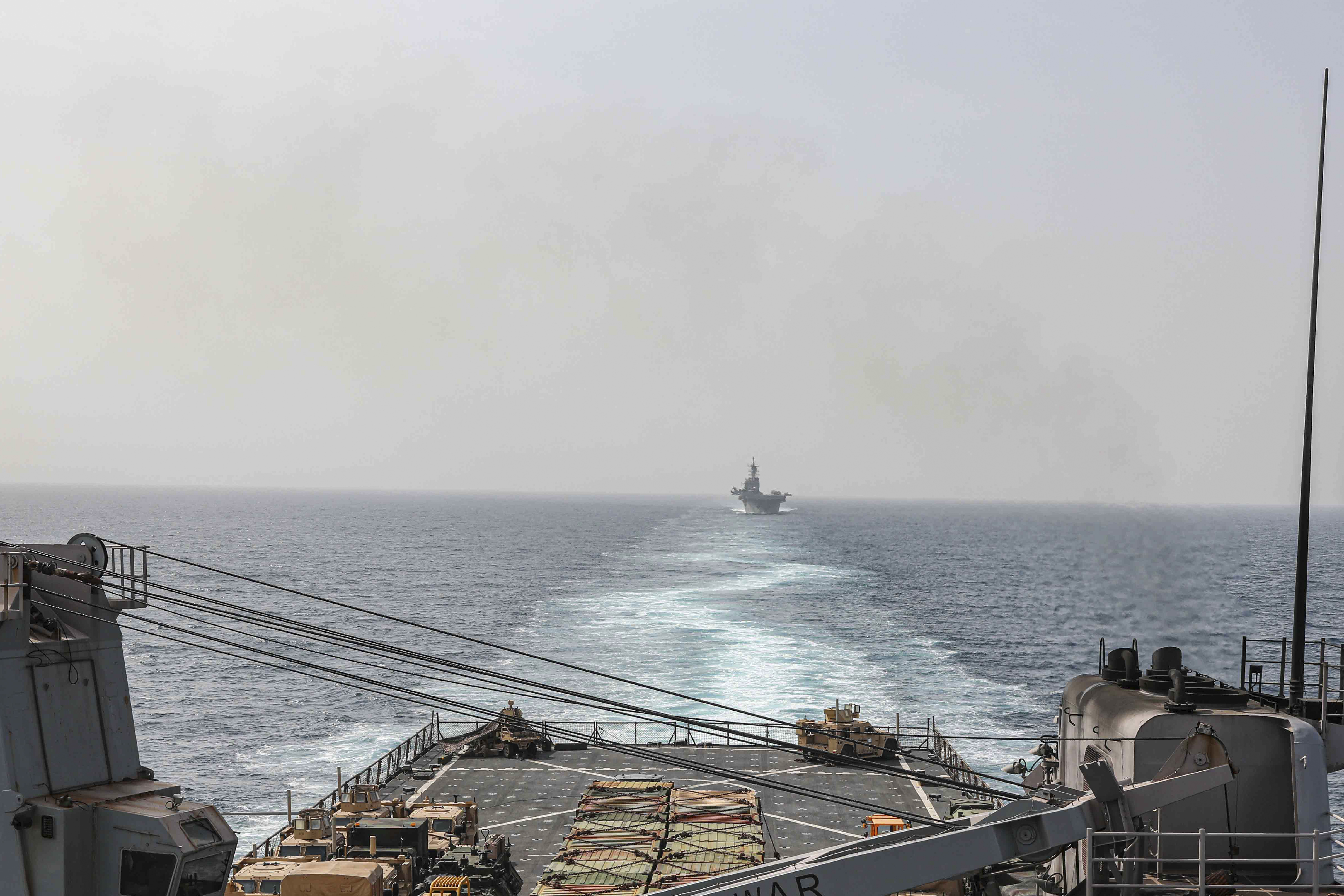 A view of two ships at sea.