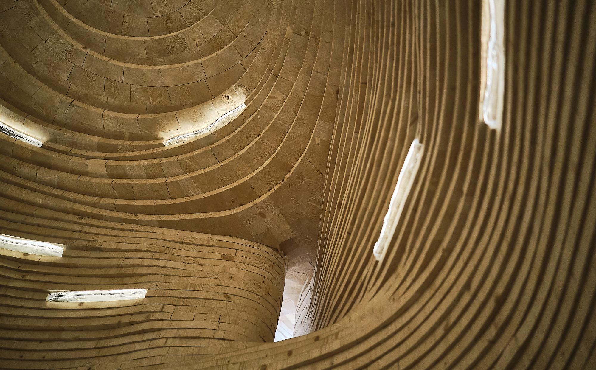 Manuscripts are slotted into the walls of the Silent Room [Anna Pivovarchuk/Al Jazeera]