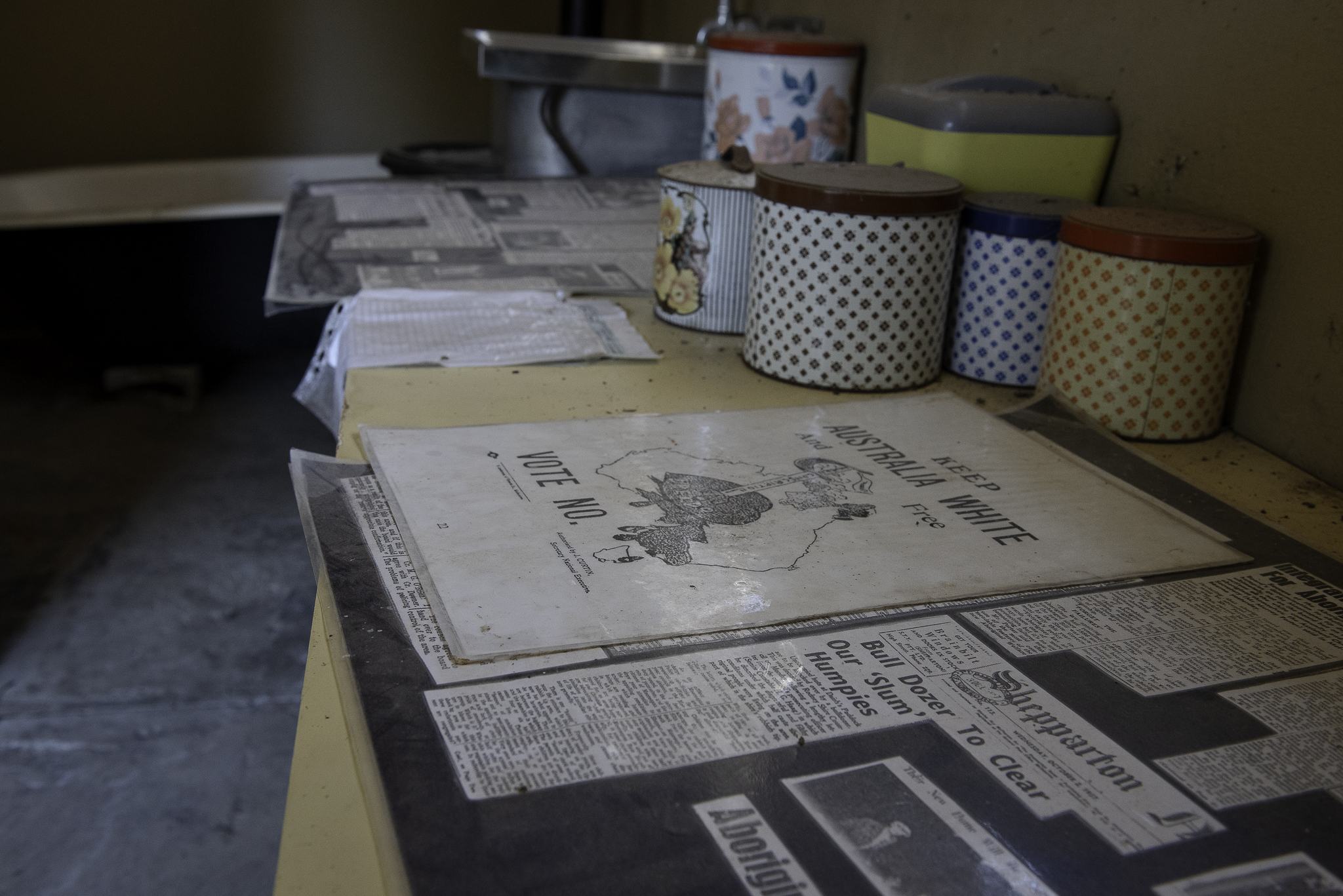 Inside a replica of the houses built for the Yorta Yorta to replace the tin and hessian huts they’d been forced to live in on the Mooroopna Flats. On the table is a historical advertisement urging voters to ‘Keep Australia White’