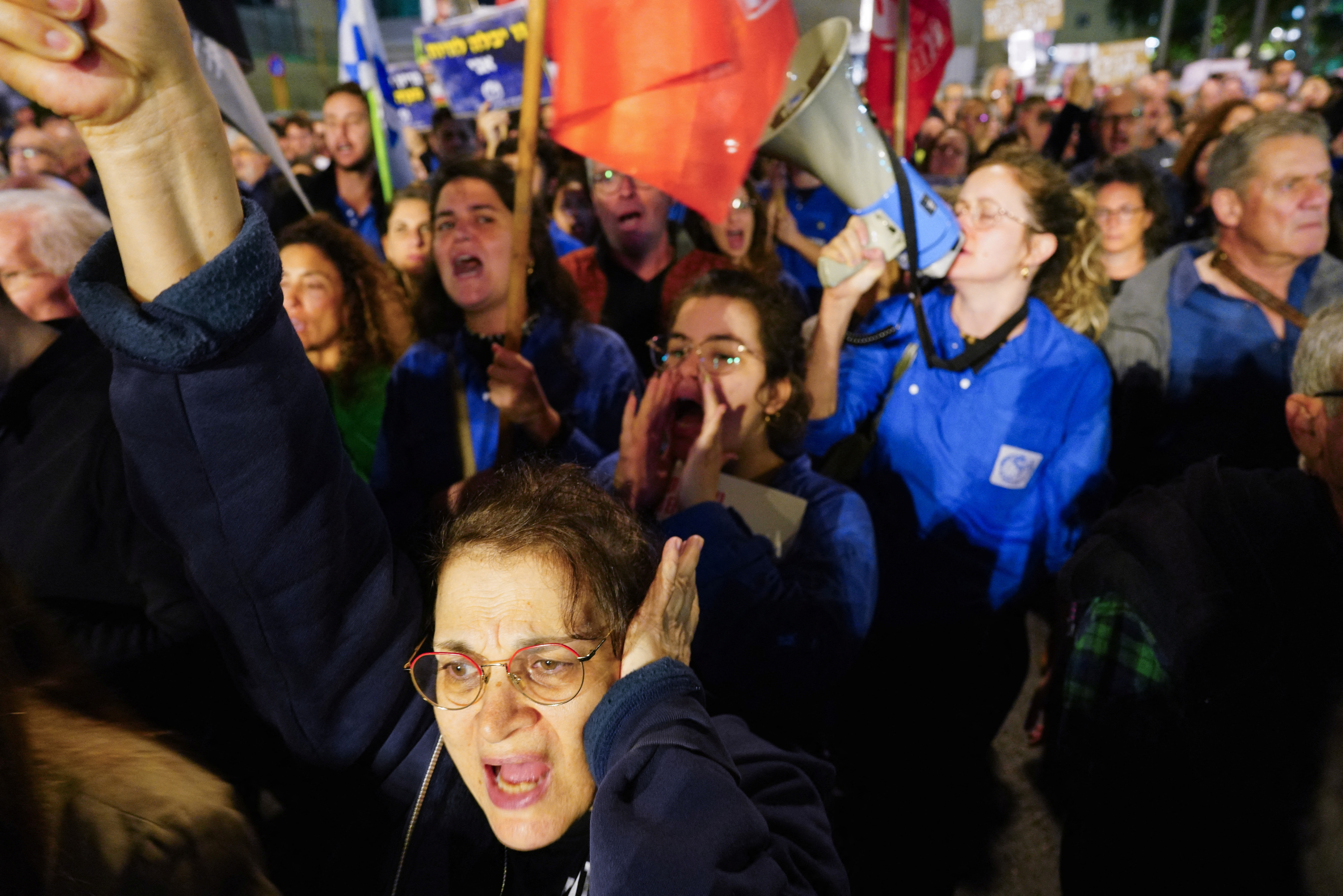 Families of hostages and supporters shout slogans as they protest to call for the release of hostages kidnapped on the deadly October 7 attack by Palestinian Islamist group
