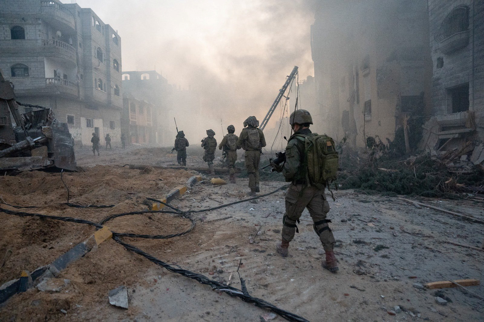 Israeli soldiers operate in the Gaza Strip on January 21, 2024 [Israeli Army/Handout via Reuters]