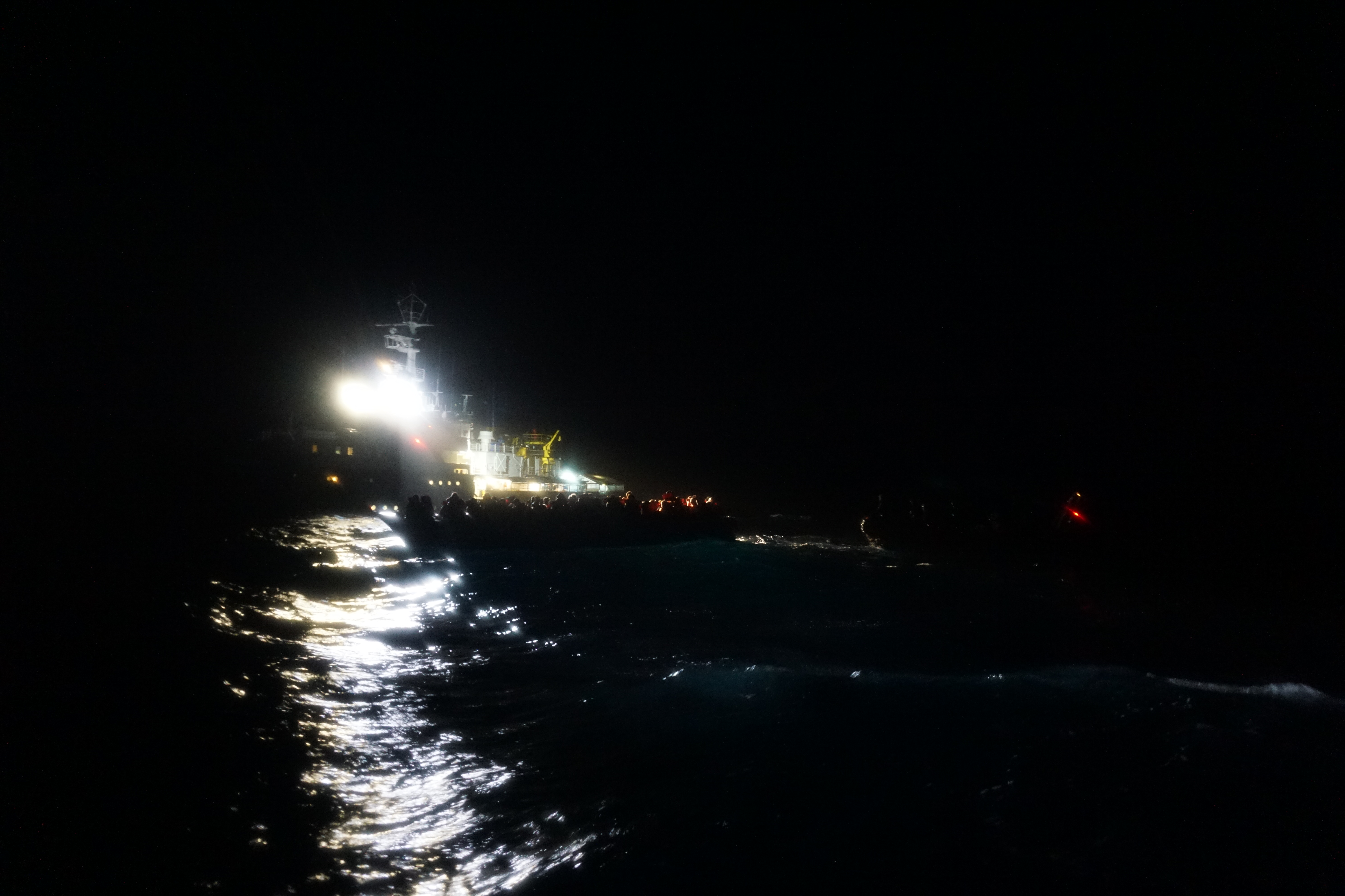 dark sea and a ship's lights