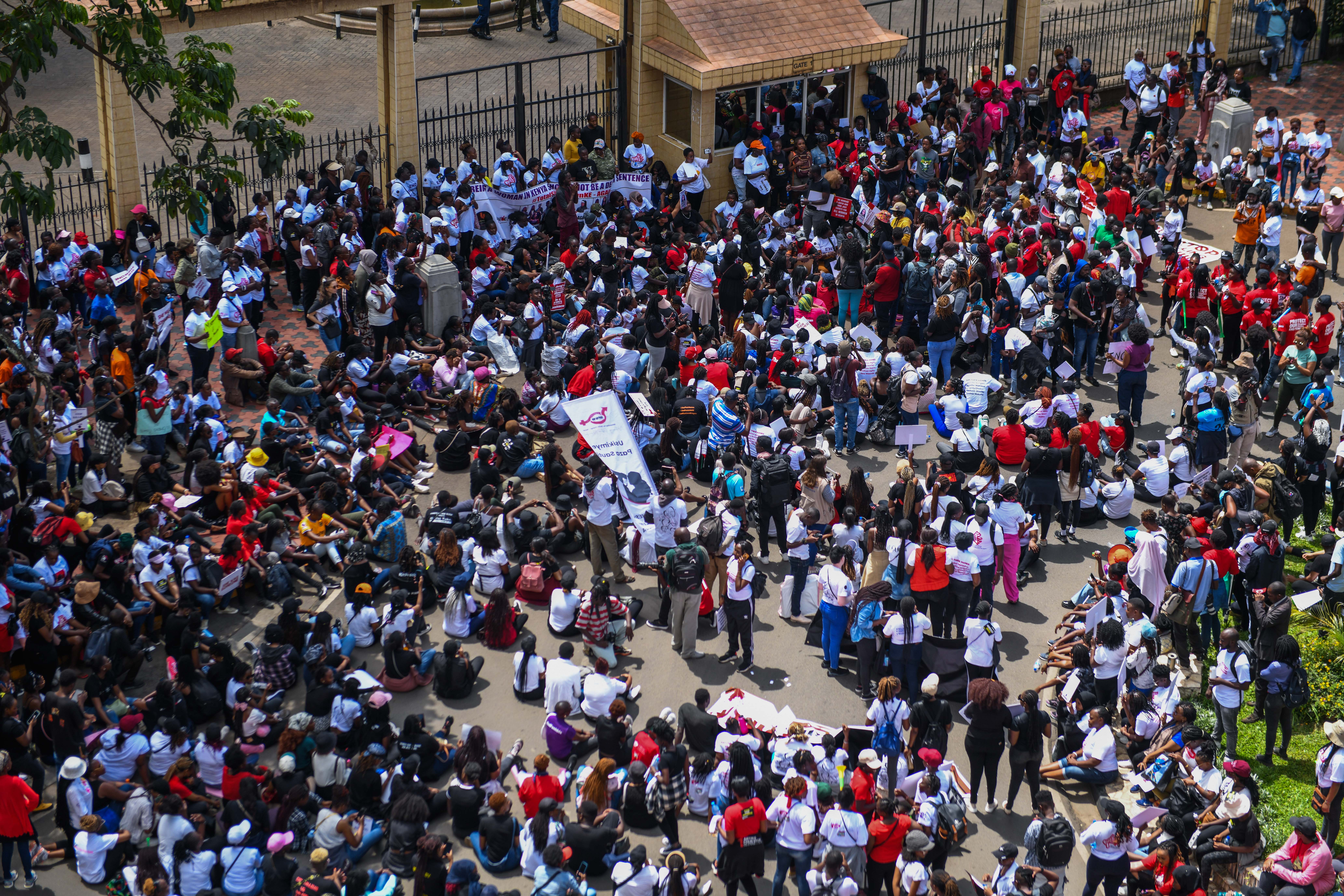 People gather to stage a protest against increasing violence against women in the country as they march to the parliamentary building and supreme court in Nairobi, Kenya on January 27