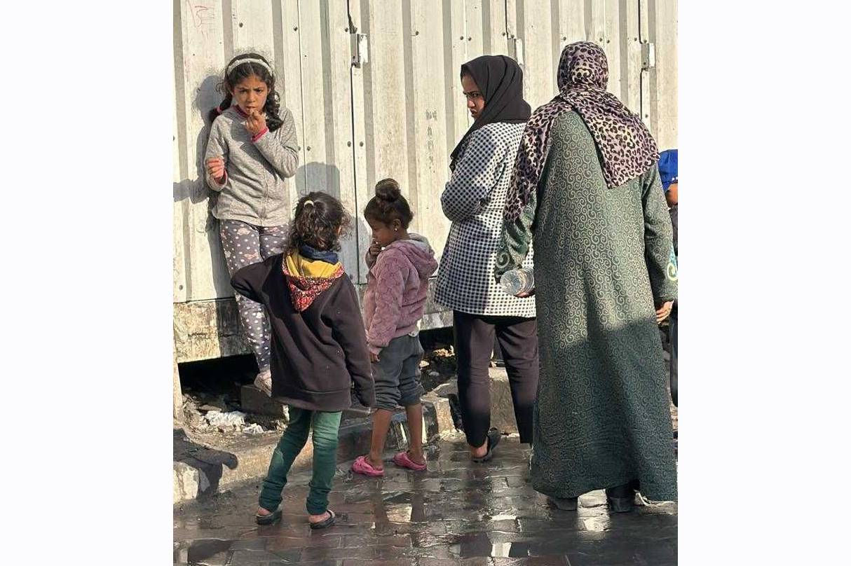 The line of women and girls waiting for the bathroom at the Khan Younis Training College [Courtesy of Hussein Owda]