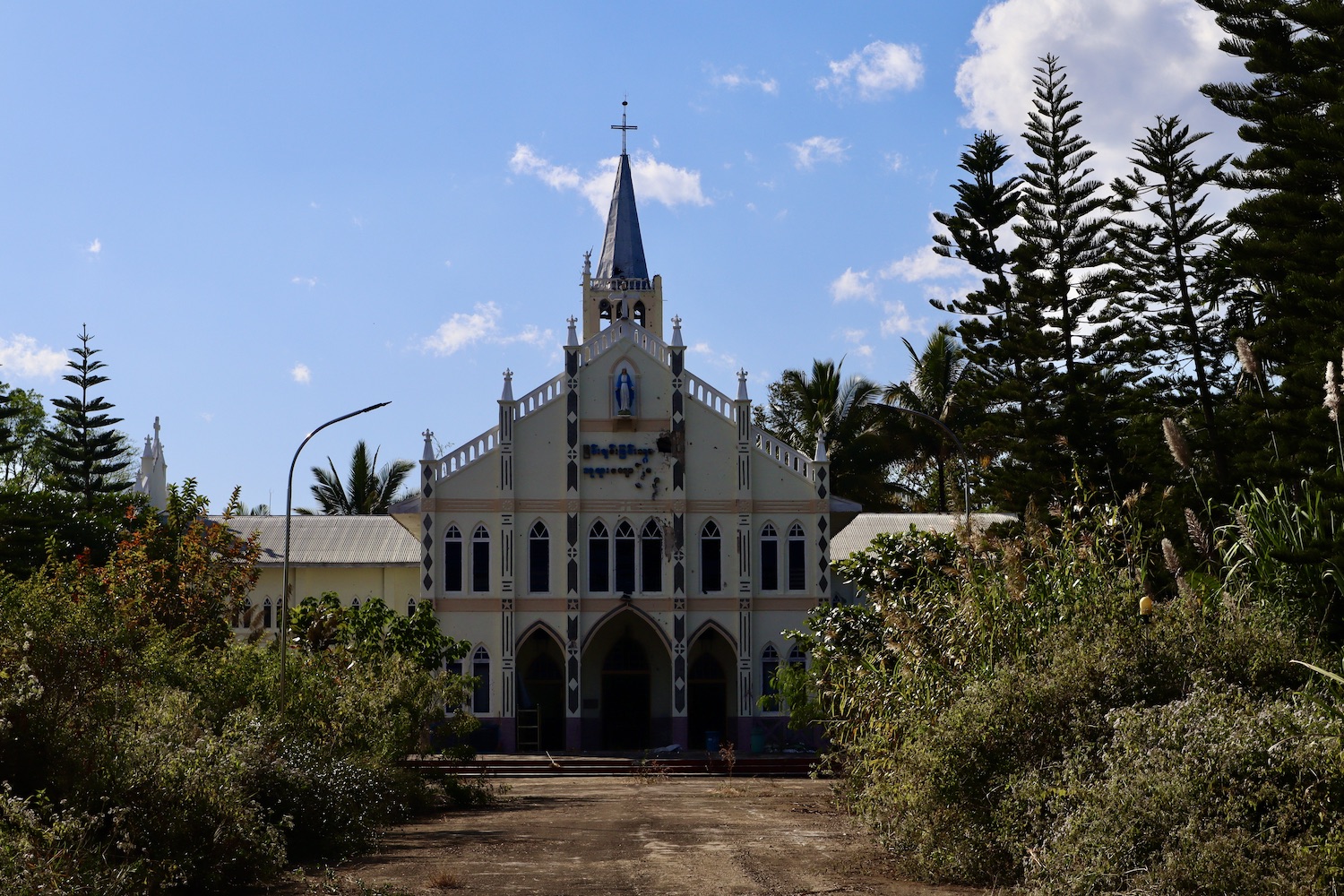 A church damaged by fighting in Demoso township