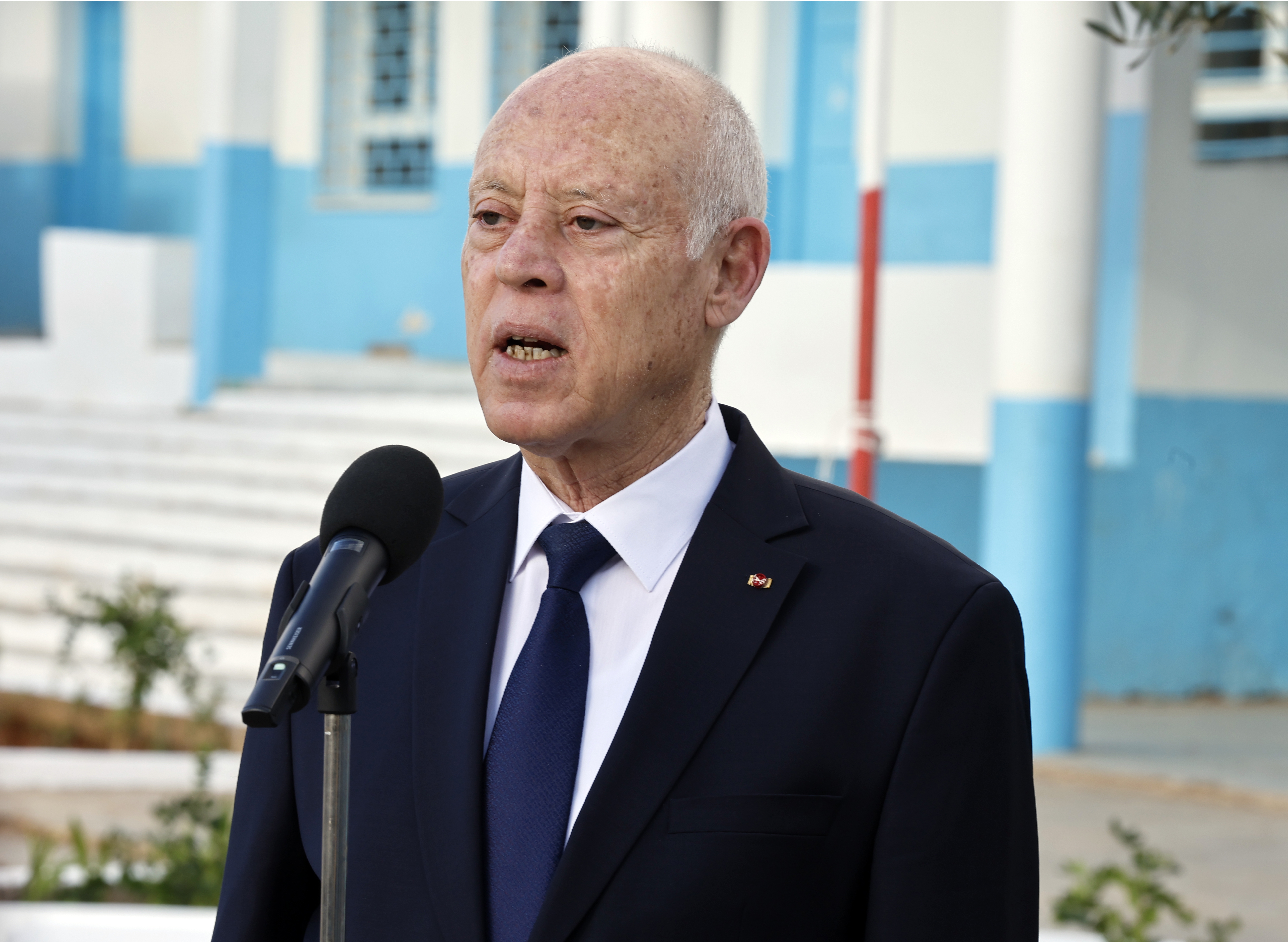 Tunisia's President Kais Saied speaks to the media