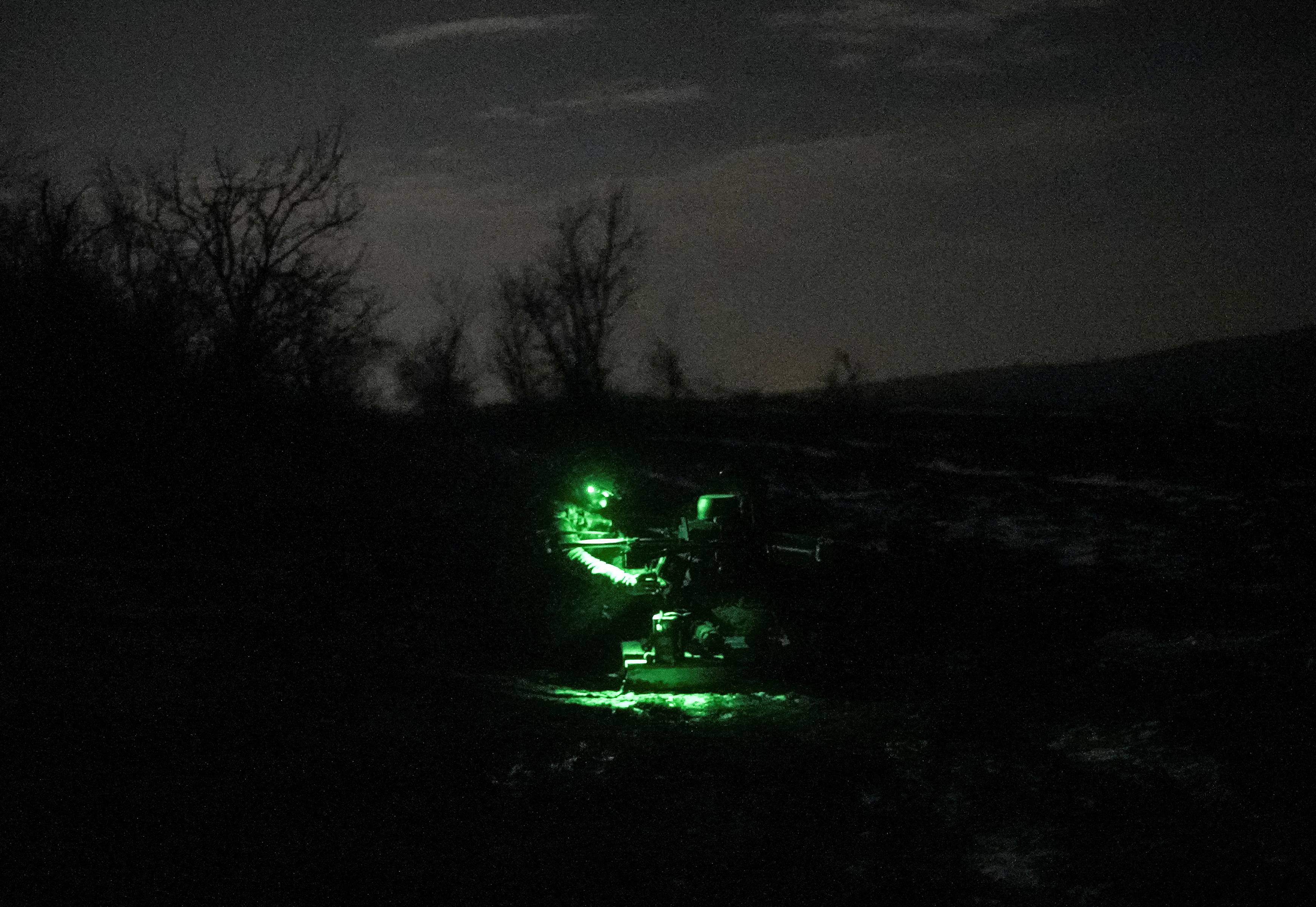 A Ukrainian serviceman of the attack drones battalion of the Achilles 92nd brigade, prepares a Vampire combat drone before flying over positions of Russian troops near the frontline town of Bakhmut, amid Russia's attack on Ukraine, in Donetsk region, Ukraine February 1