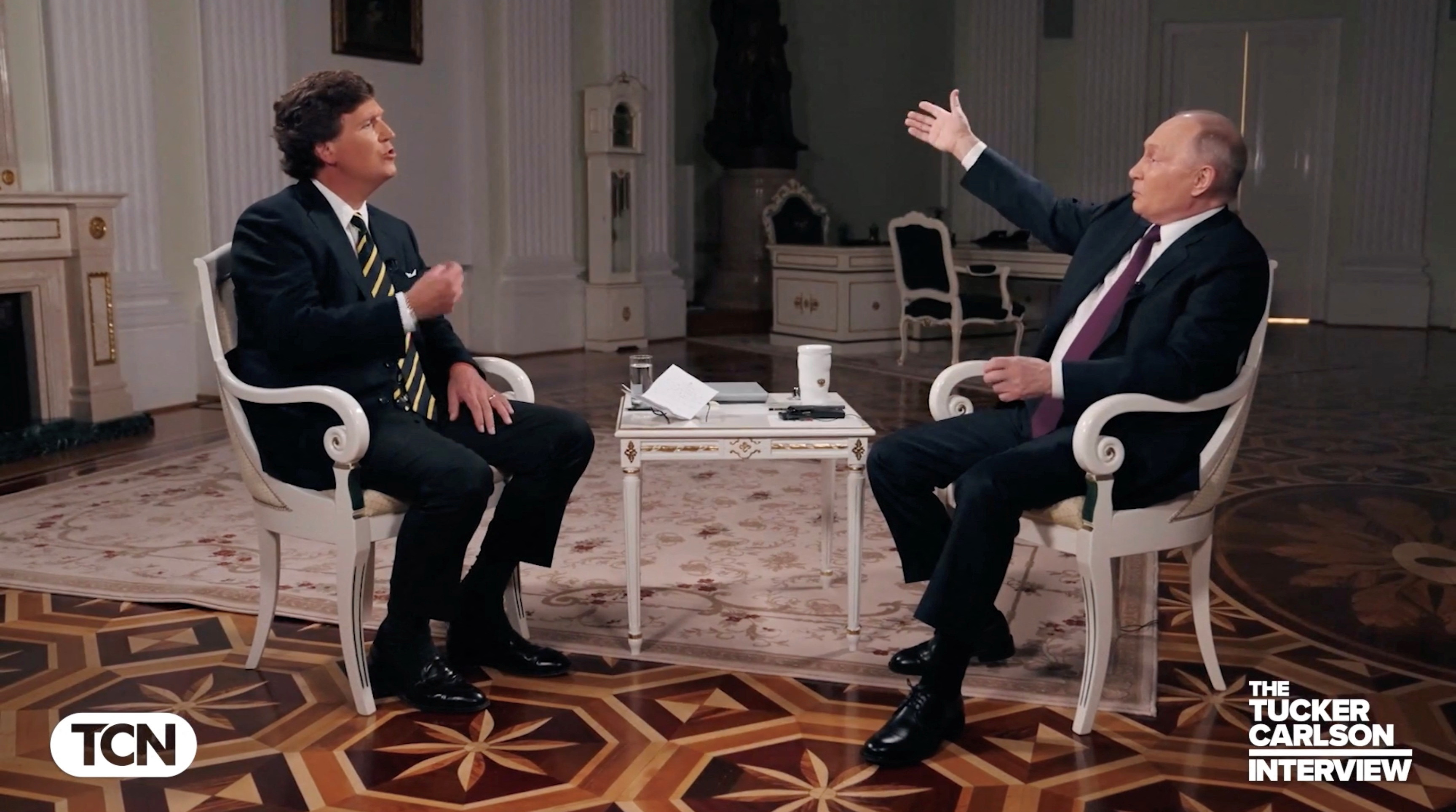 Russian President Vladimir Putin speaks during an interview with US television host Tucker Carlson in Moscow