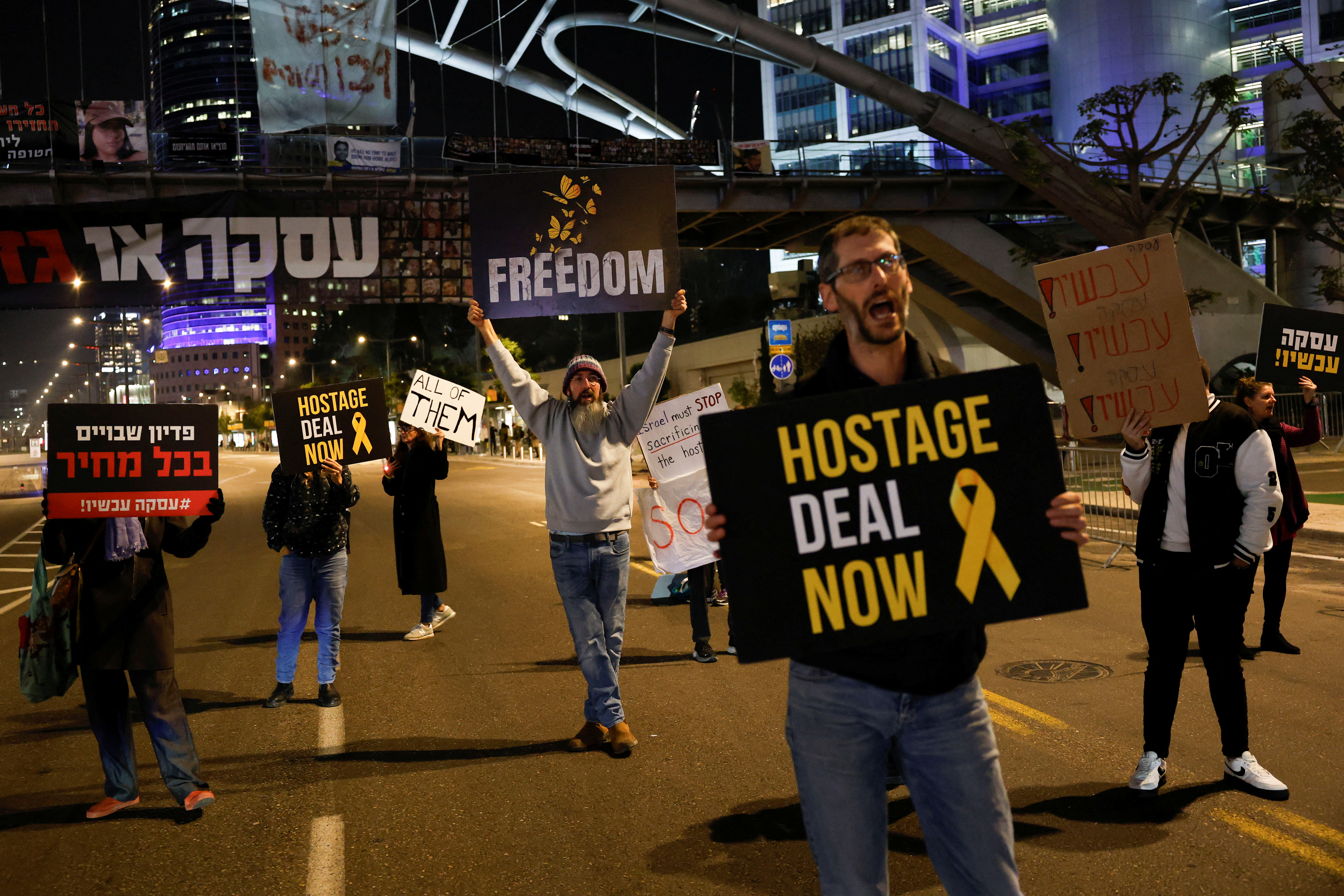 Supporters of hostages take part in a protest calling for their release