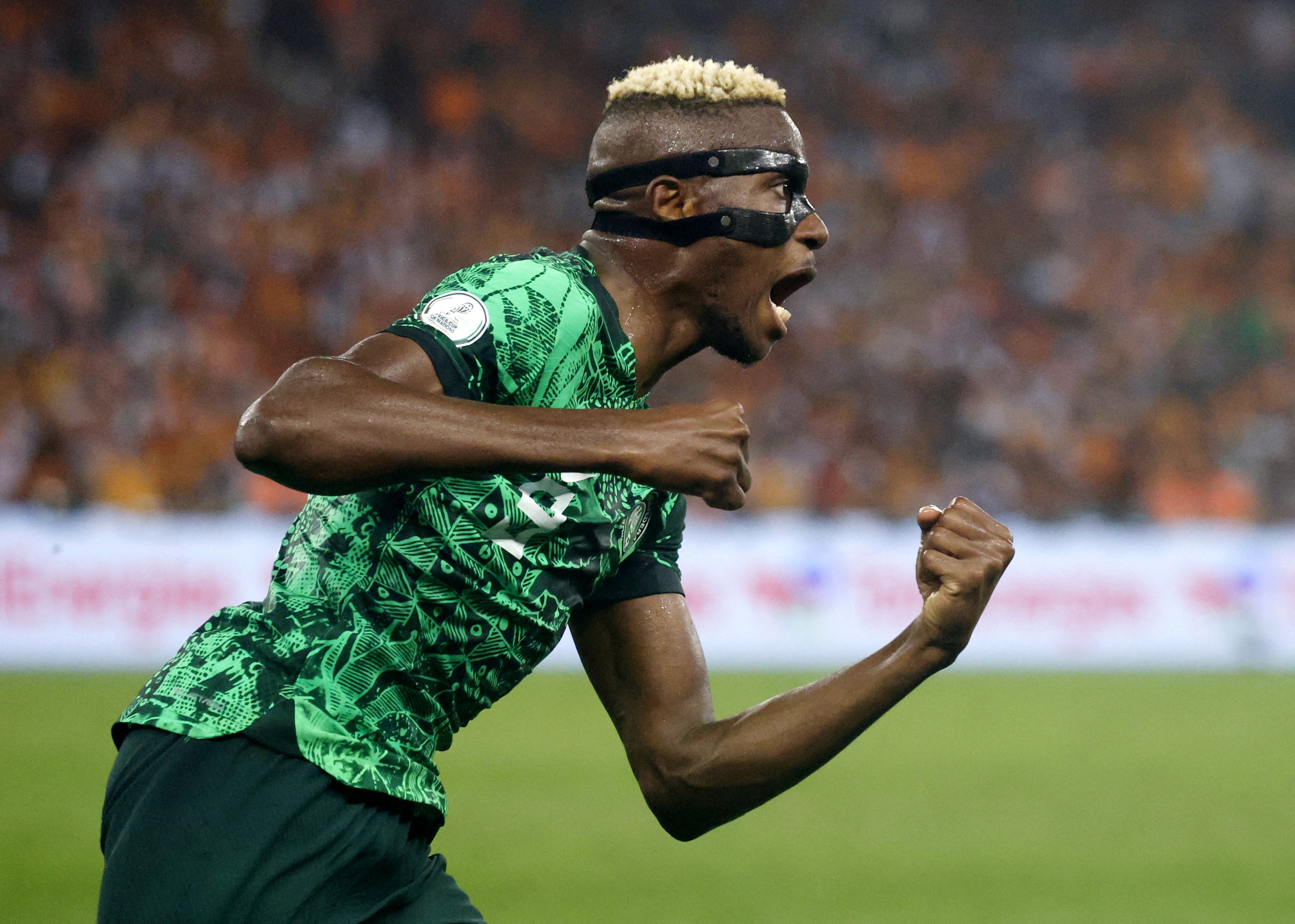 Soccer Football - Africa Cup of Nations - Final - Nigeria v Ivory Coast - Stade Olympique Alassane Ouattara, Abidjan, Ivory Coast - February 11, 2024 Nigeria's Victor Osimhen celebrates after William Troost-Ekong scores their first goal REUTERS/Luc Gnago