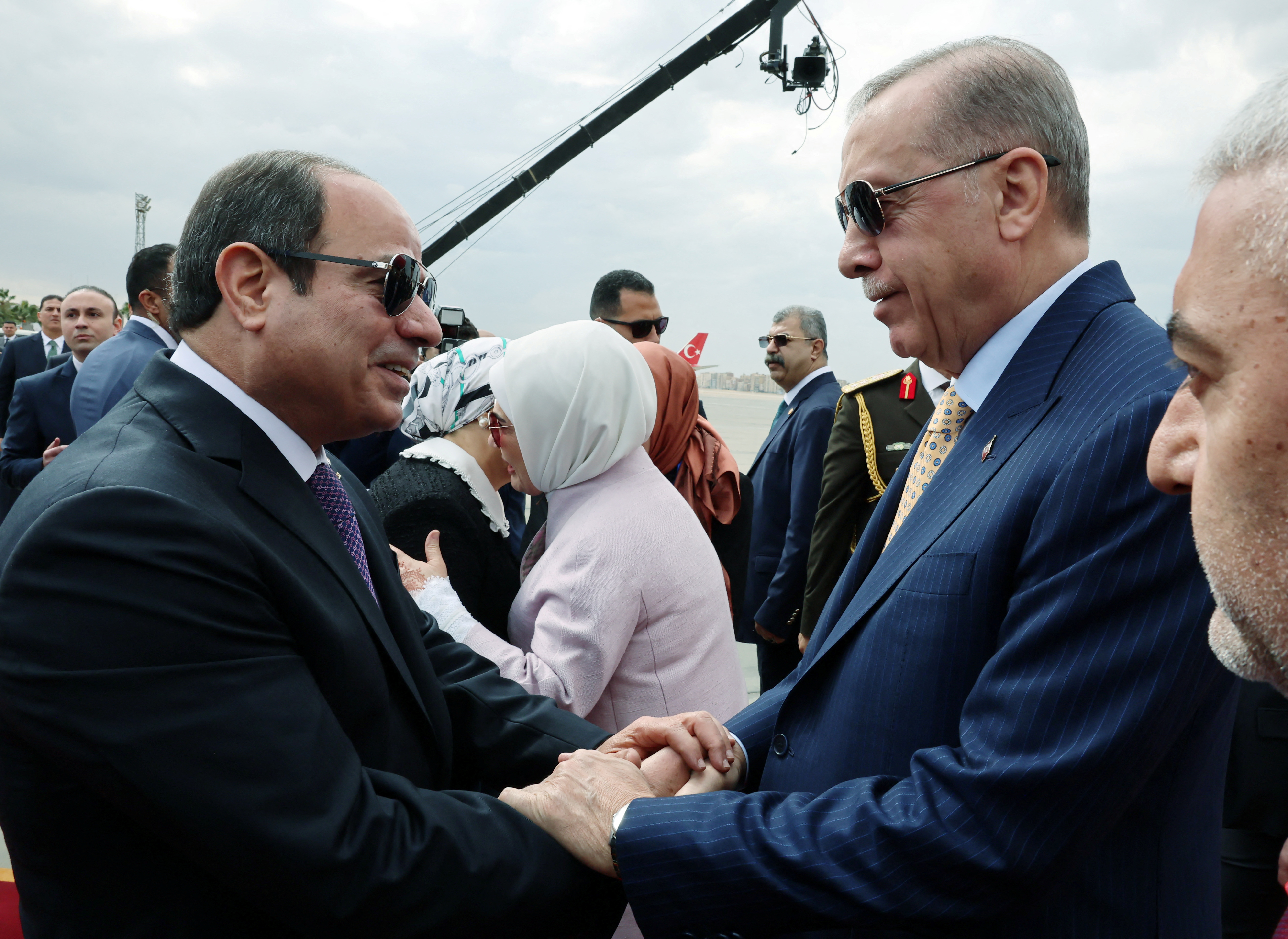 Turkey’s President Tayyip Erdogan is welcomed by Egypt's President Abdel Fattah al-Sisi at the airport in Cairo, Egypt