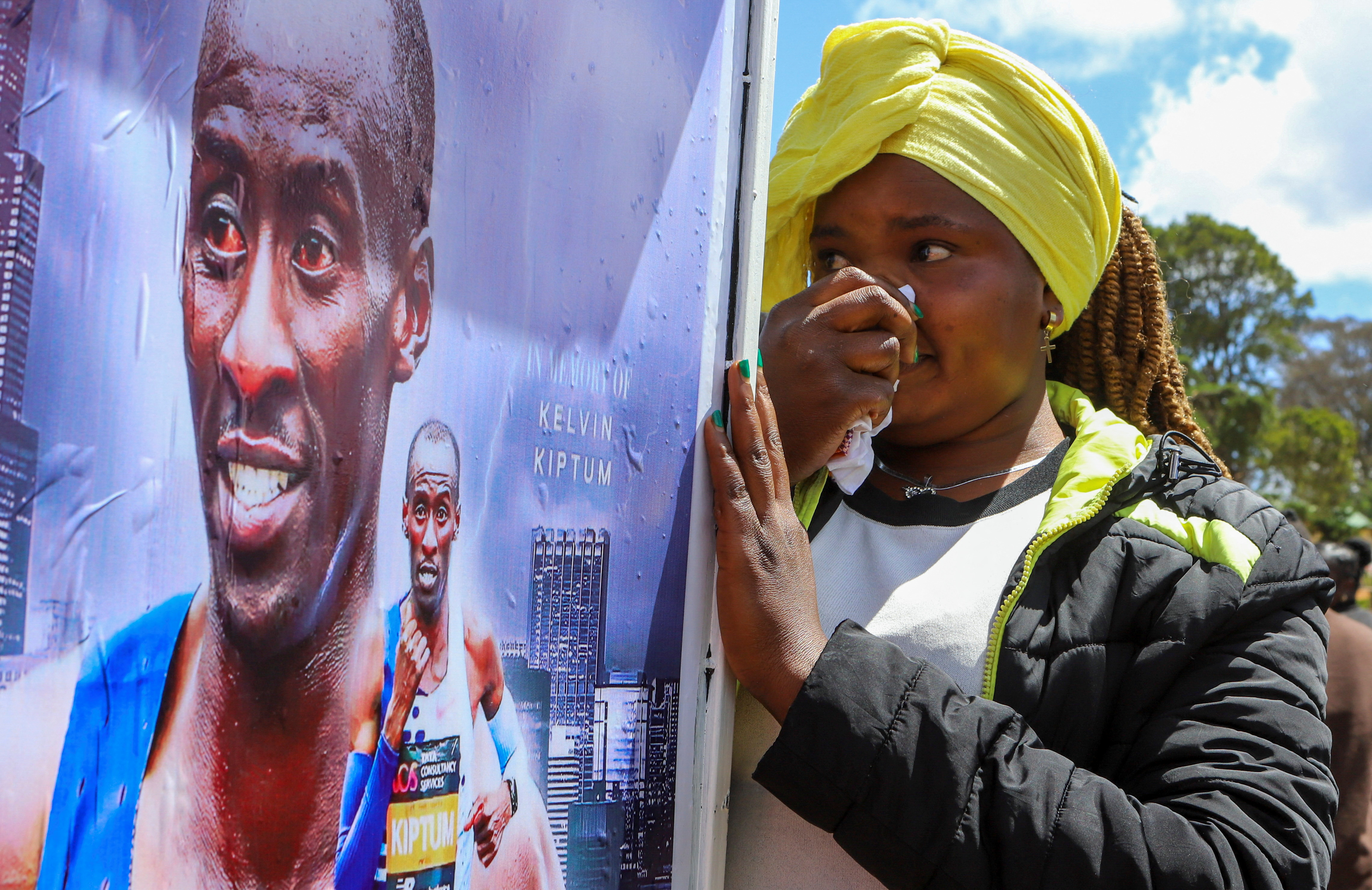 A woman mourns after viewing Kiptum’s body [Reuters]