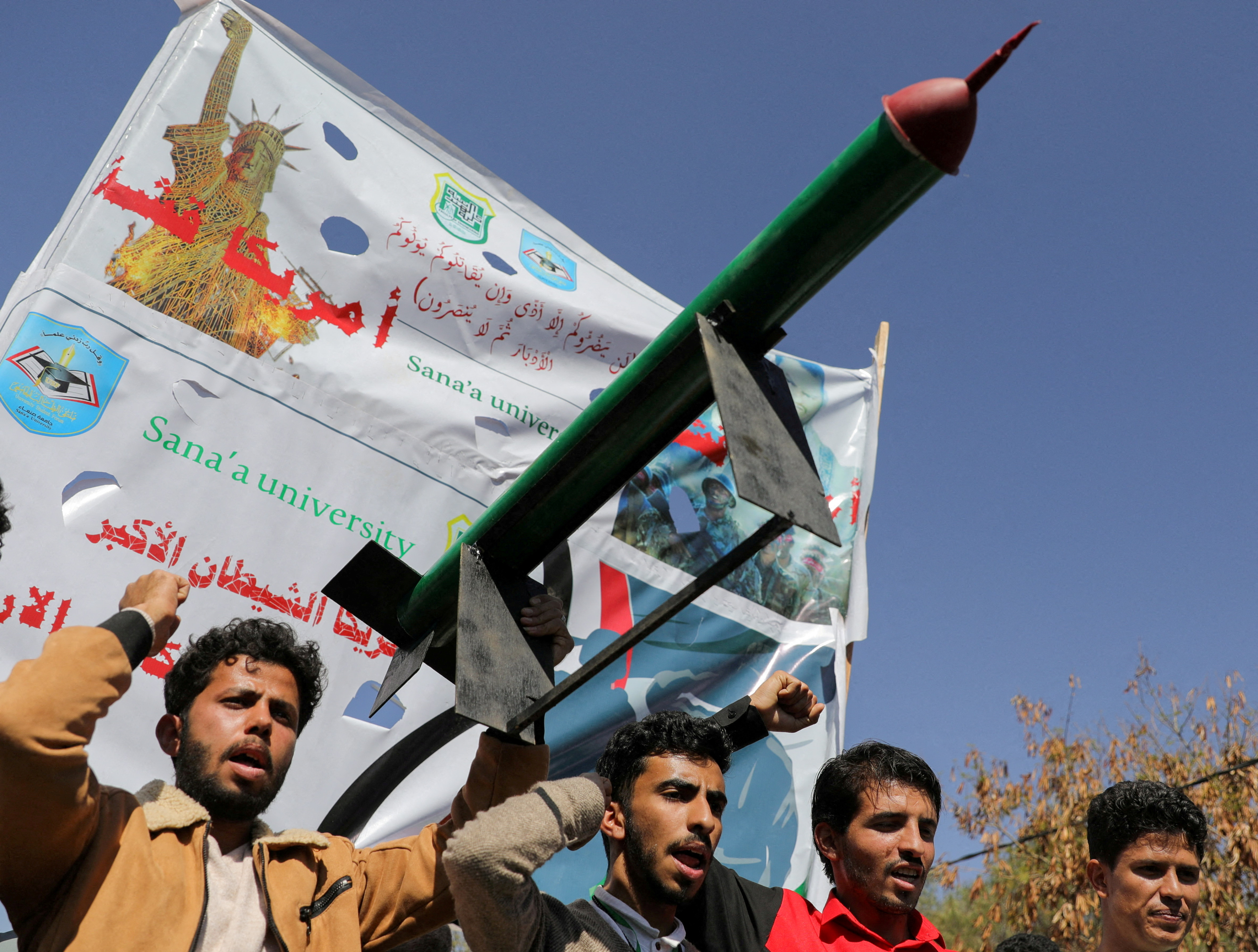 A mock missile is carried by university students during a rally to show support for the Palestinians in the Gaza Strip and the recent Houthi strikes on ships in the Red Sea and the Gulf of Aden, in Sanaa, Yemen January 31, 2024.