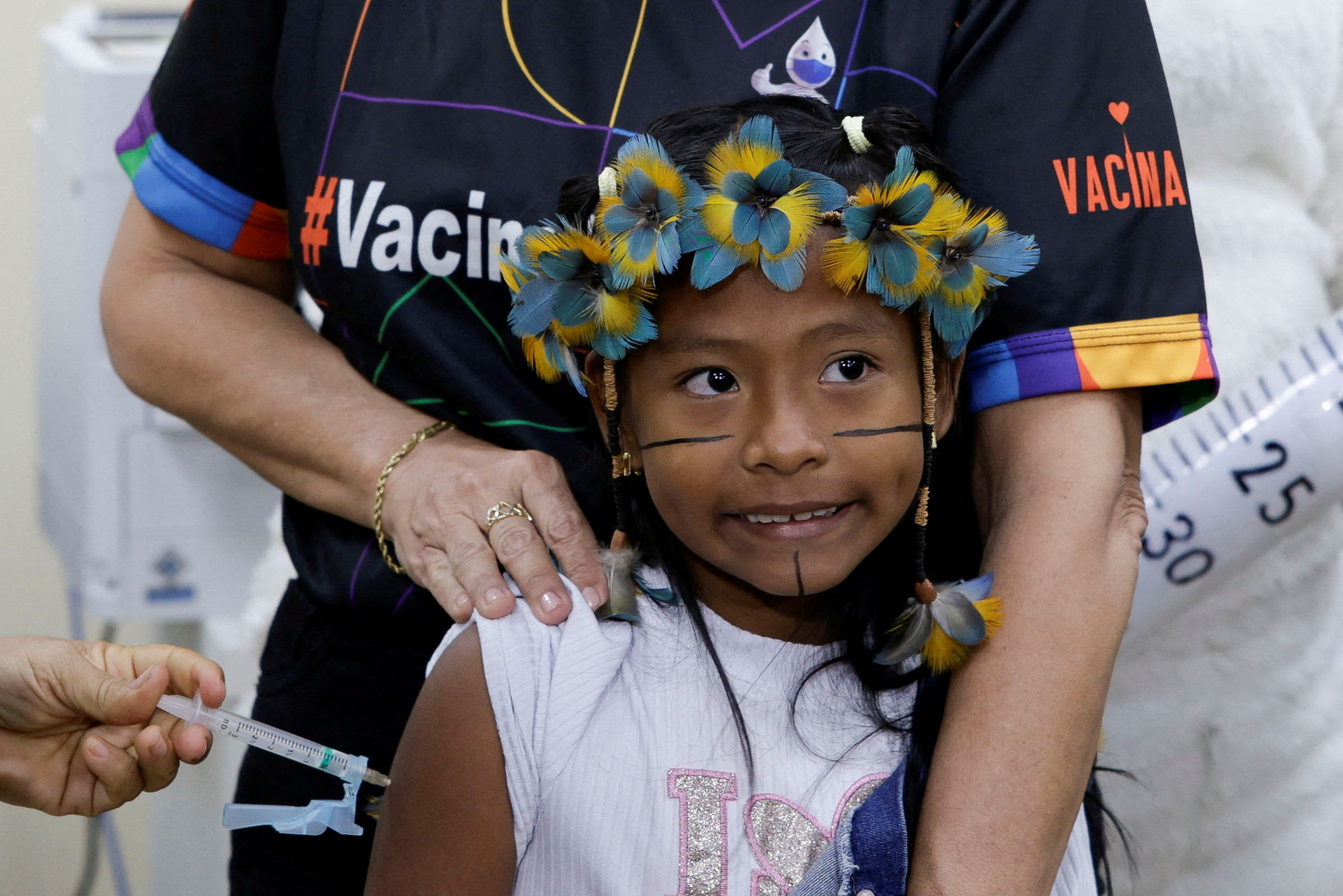 Anita Jose Rodrigues, 10, receives the dengue vaccine Qdenga during a vaccination campaign, at the at Parque das Tribos in Manaus, Brazil February 22