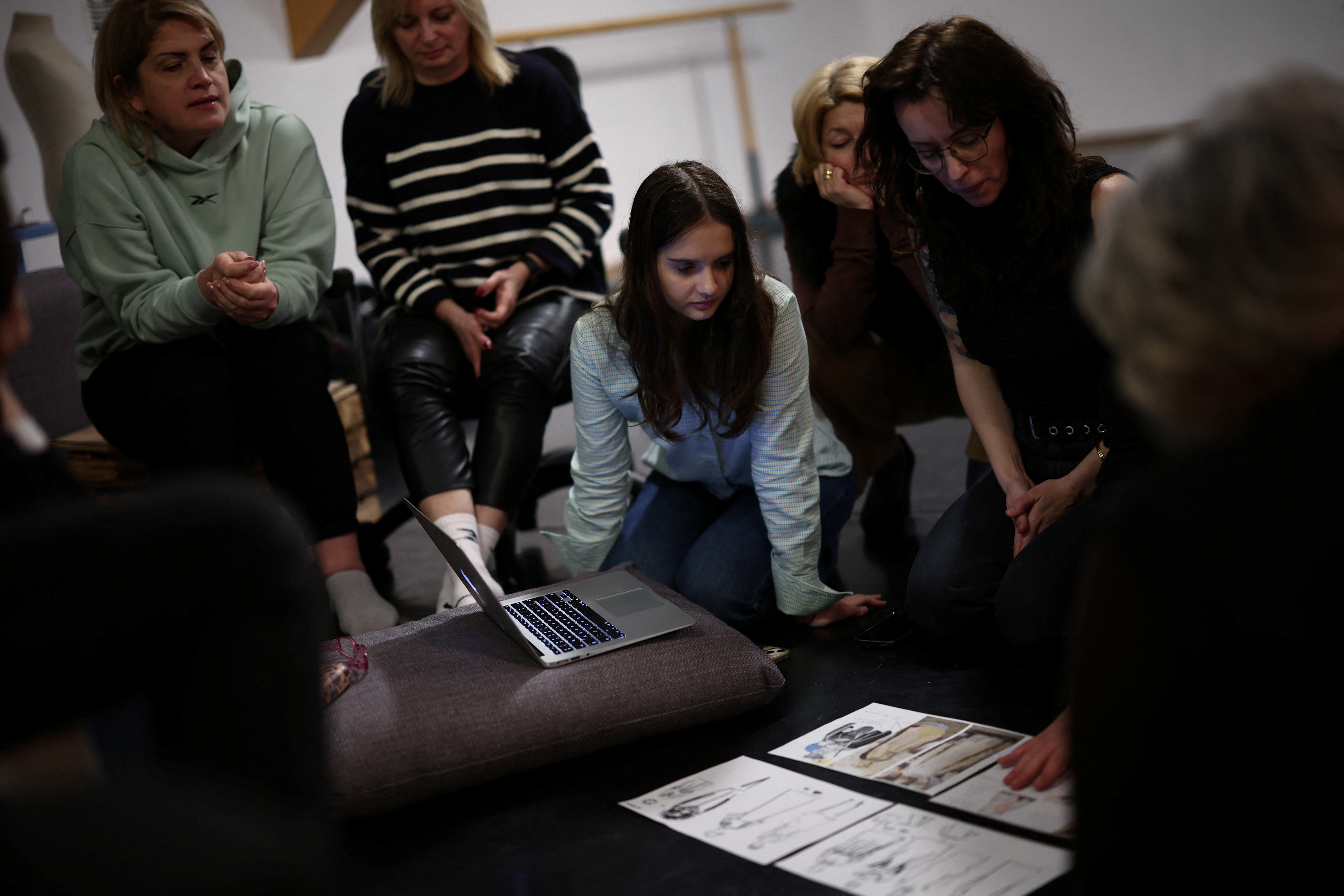 Marharyta Chykalova, 16, from Kherson, takes part in costume preparation before the rehearsal of a play during a theatre class at the Atelier Theatre in Sopot, Poland, February 17