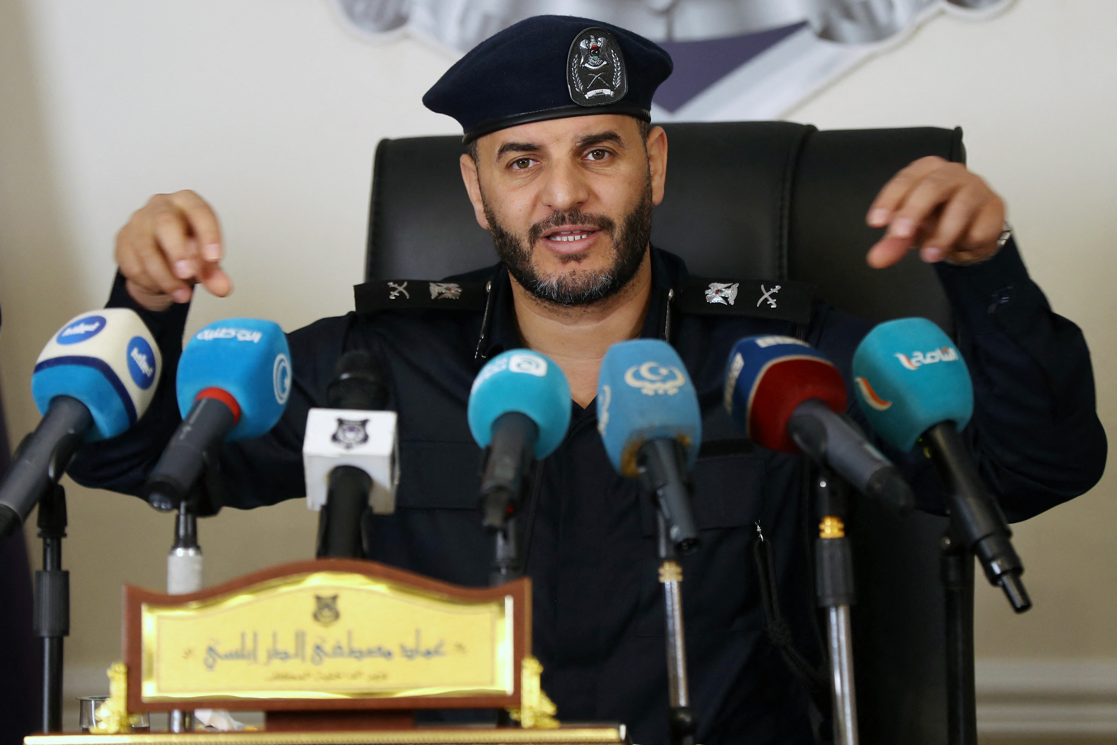 The Minister of the Interior of the Libyan National Unity Government Imed Trabelsi, speaks at a press conference in Tripoli on February 21, 2024. (Photo by Mahmud Turkia / AFP)