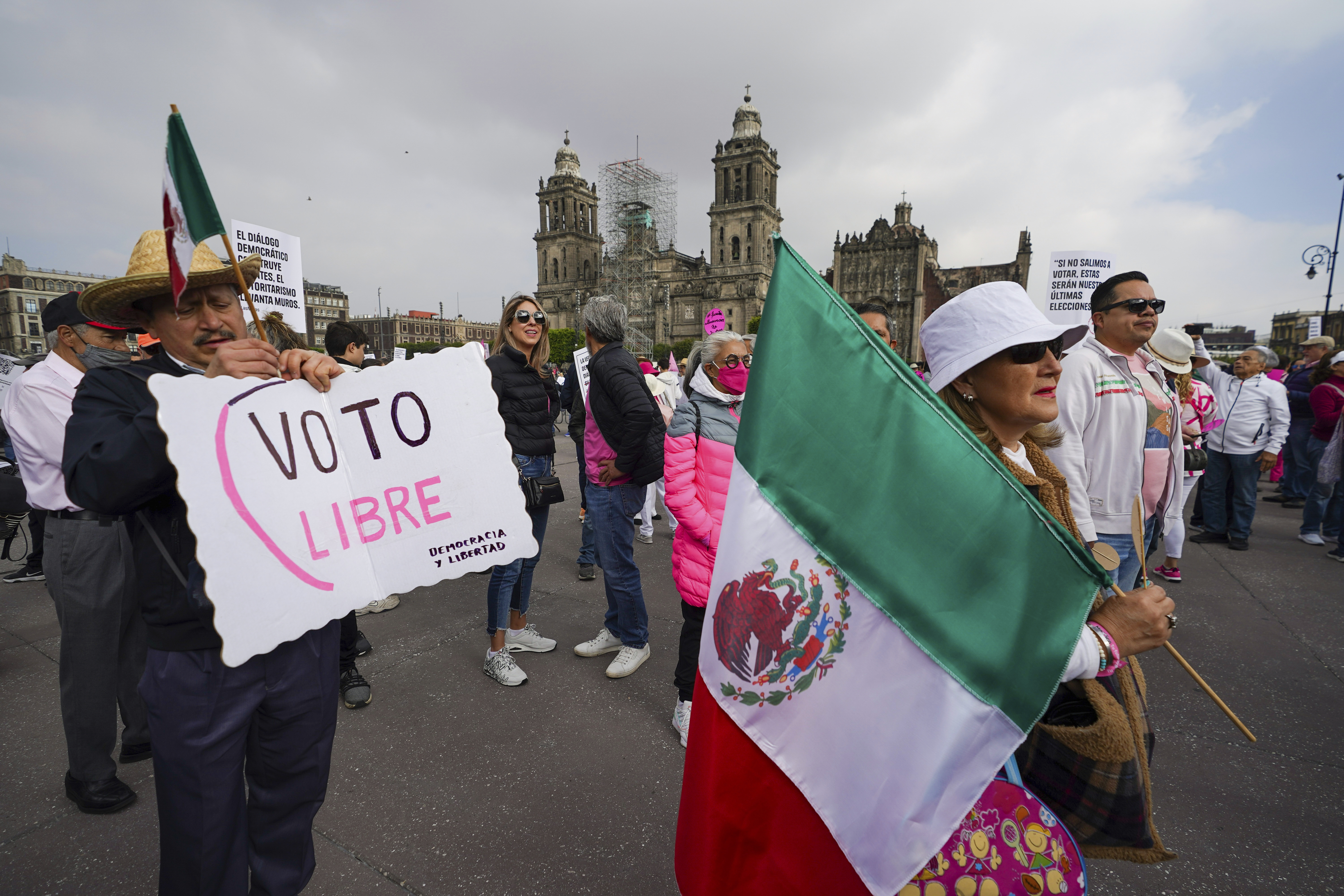 People take parte in a march organized by citizen organizations demanding that electoral autonomy be respected in the upcoming general elections in downtown Mexico City