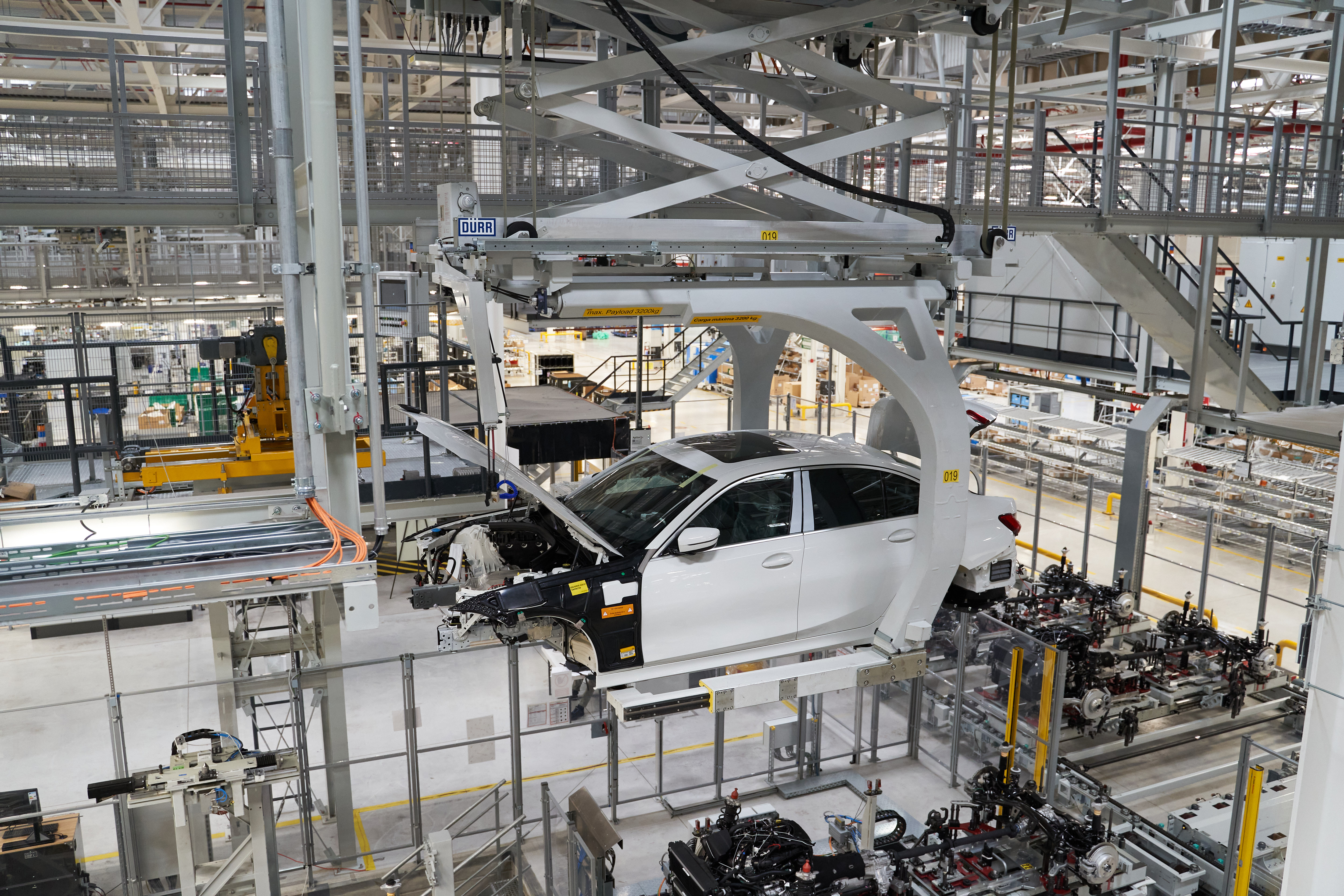 A Bayerische Motoren Werke AG (BMW) Series 3 vehicle moves along the production floor of the company's manufacturing facility in San Luis Potosi, Mexico