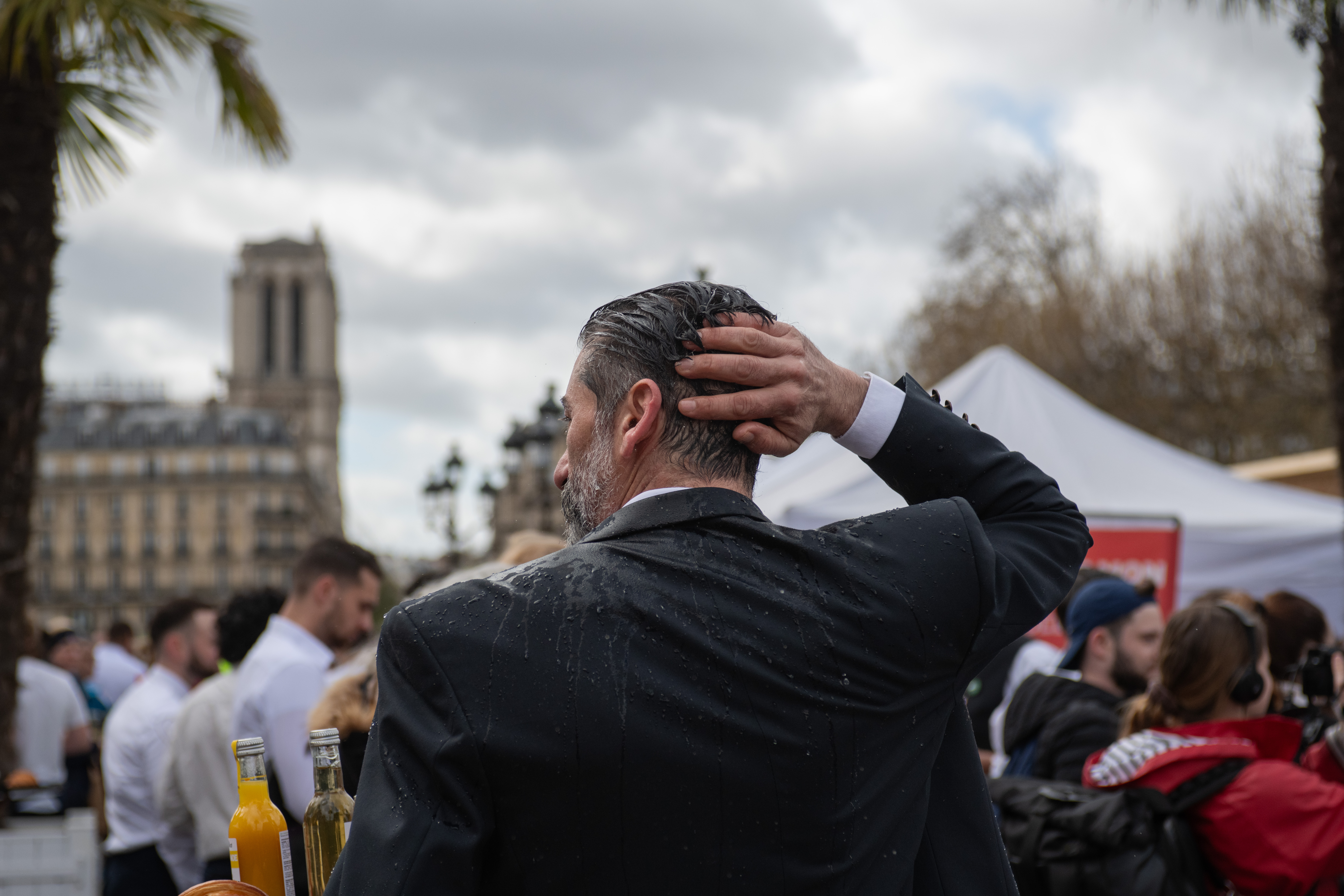 A waiter cools off after finishing.