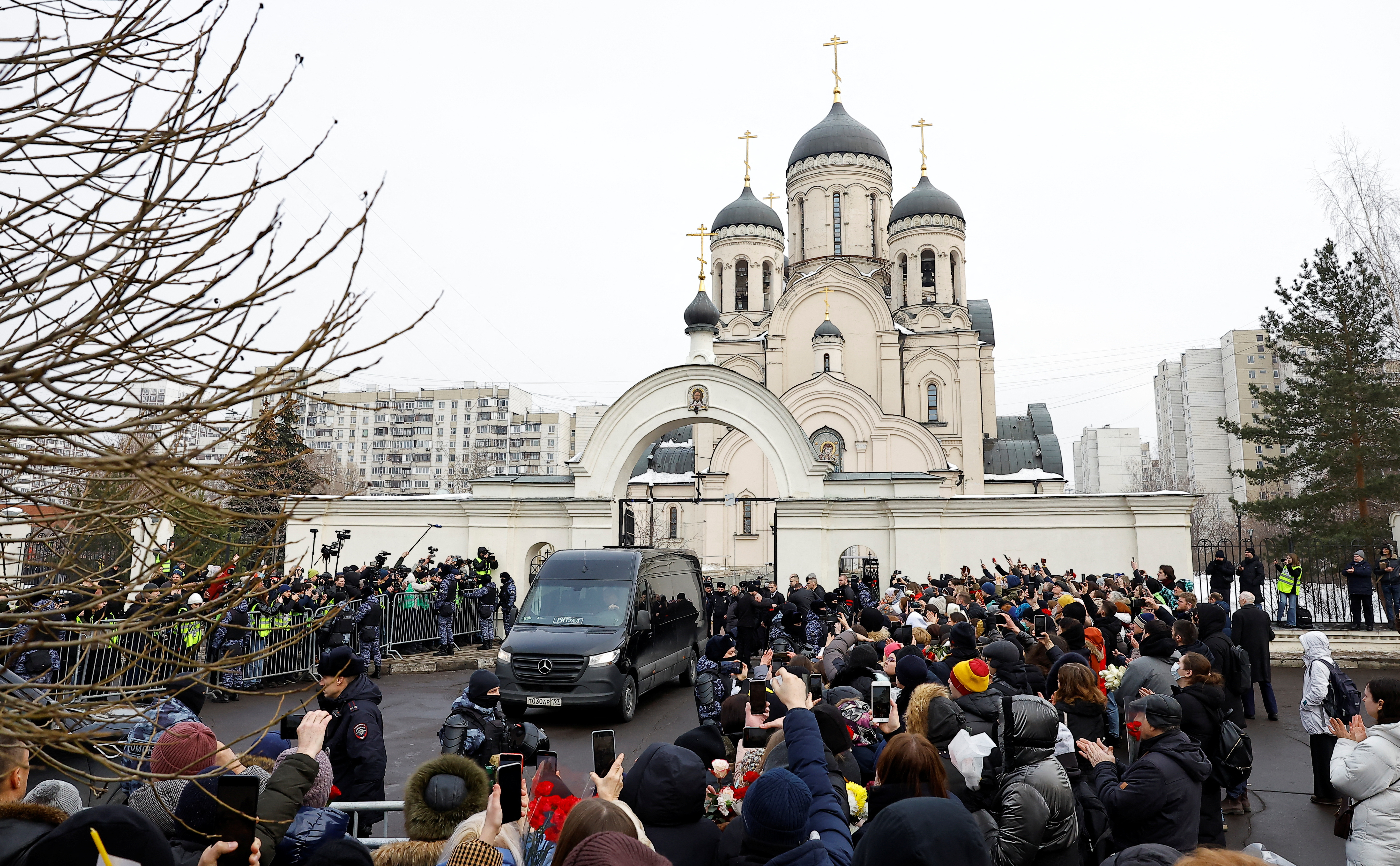 A hearse, which reportedly transports a coffin with the body of Russian opposition politician Alexei Navalny, is parked outside the Soothe My Sorrows church before a funeral service and farewell ceremony in Moscow, Russia, March 1, 2024