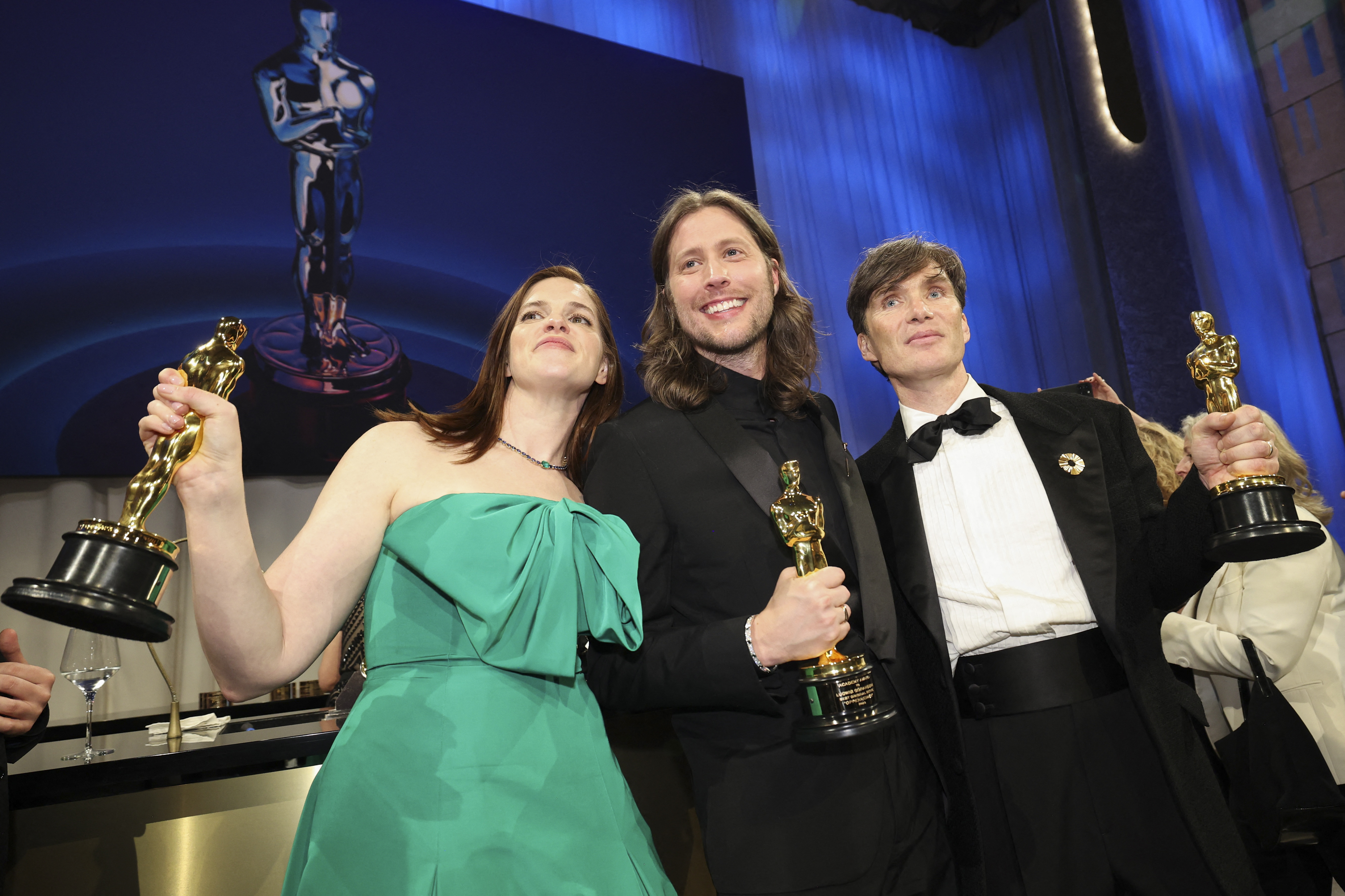 Jennifer Lame, with the Oscar for Best Film Editing for "Oppenheimer", Ludwig Goransson with the Oscar for Best Original Score for "Oppenheimer" and Cillian Murphy with the Best Actor Oscar for "Oppenheimer"
