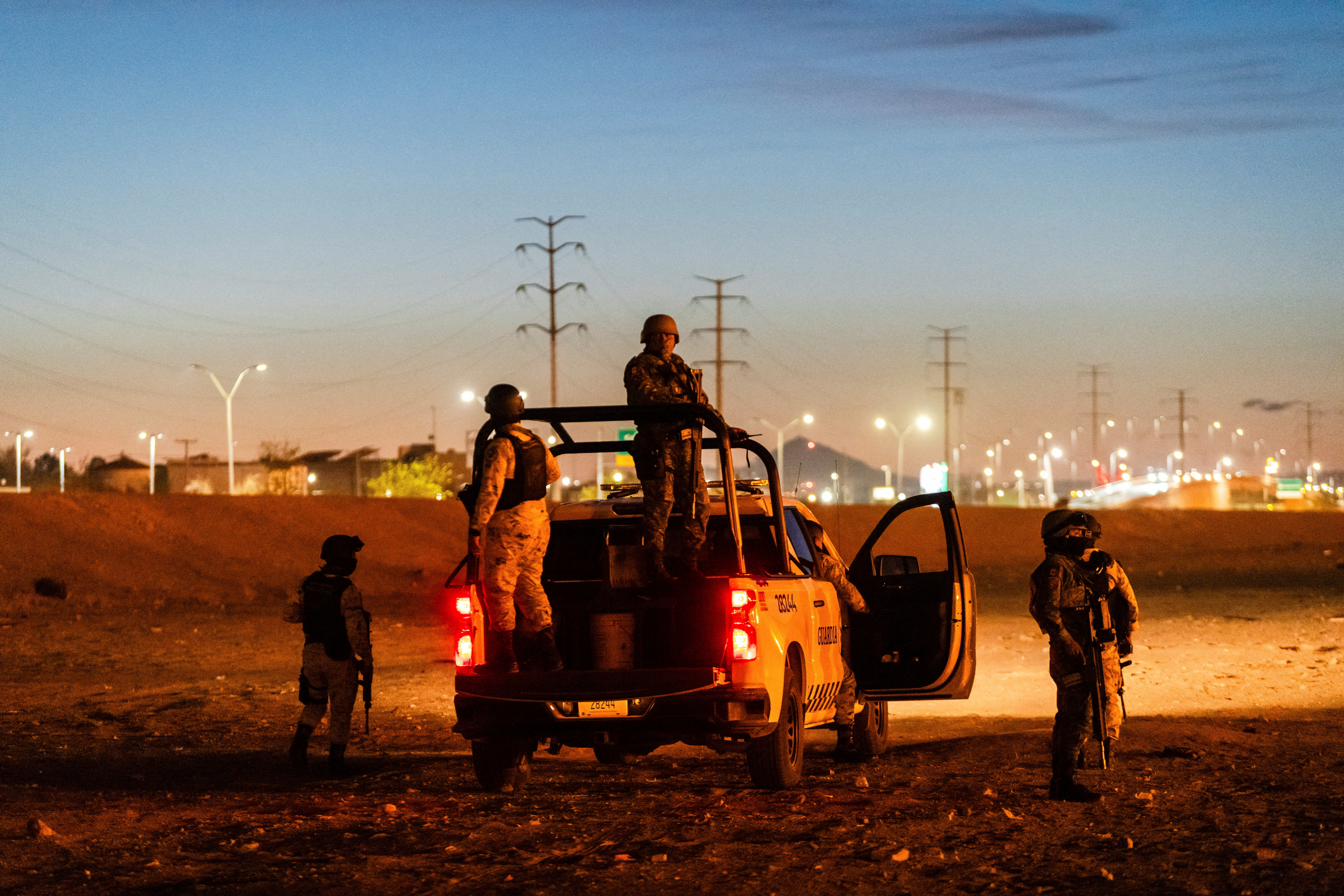 Mexican National Guard patrol along the Rio Grande