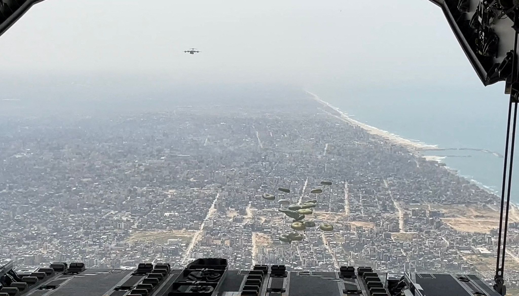 The Spanish Air Force drops humanitarian aid parcels over the Gaza Strip