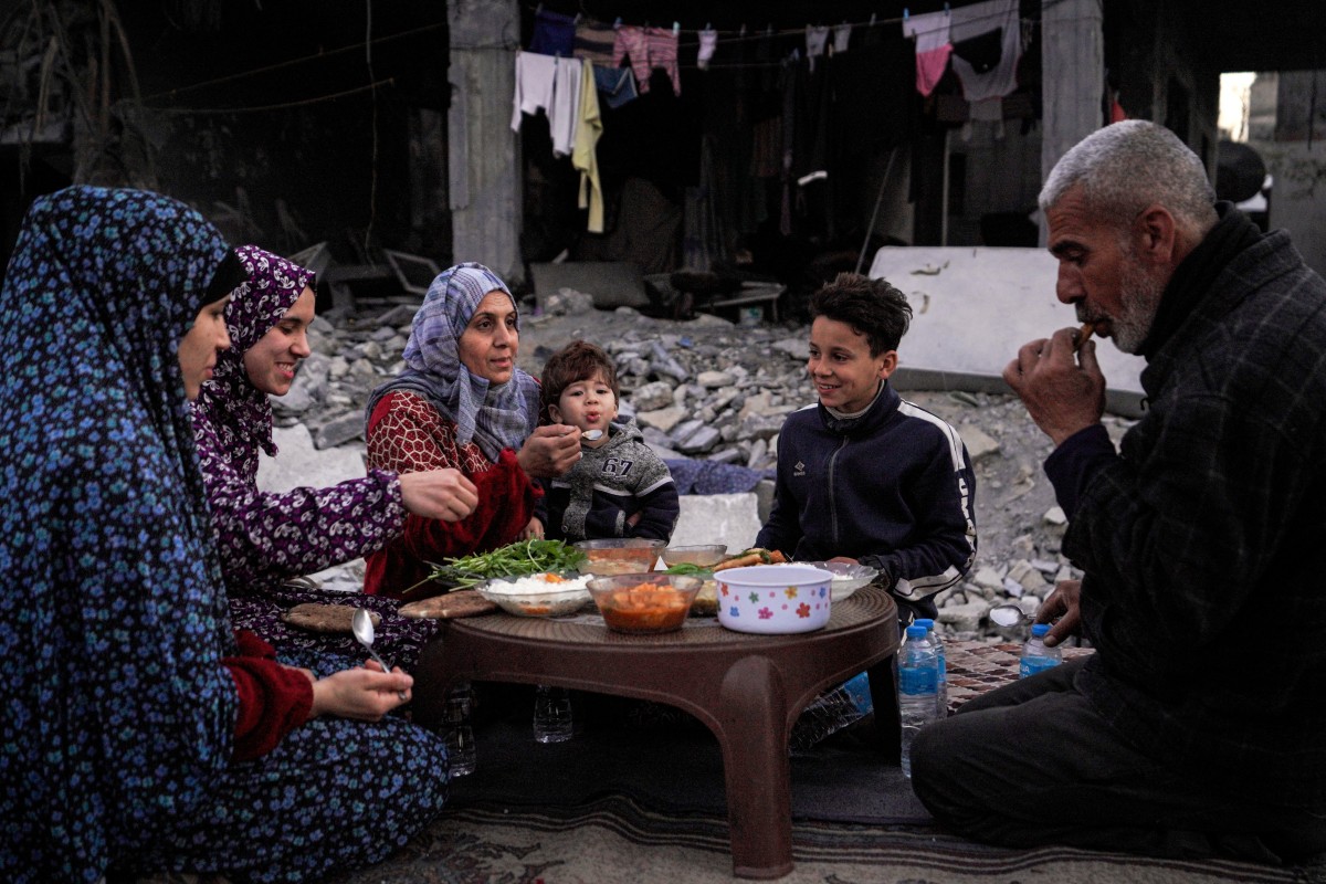 The Palestinian Al-Naji family prepare to break their fast