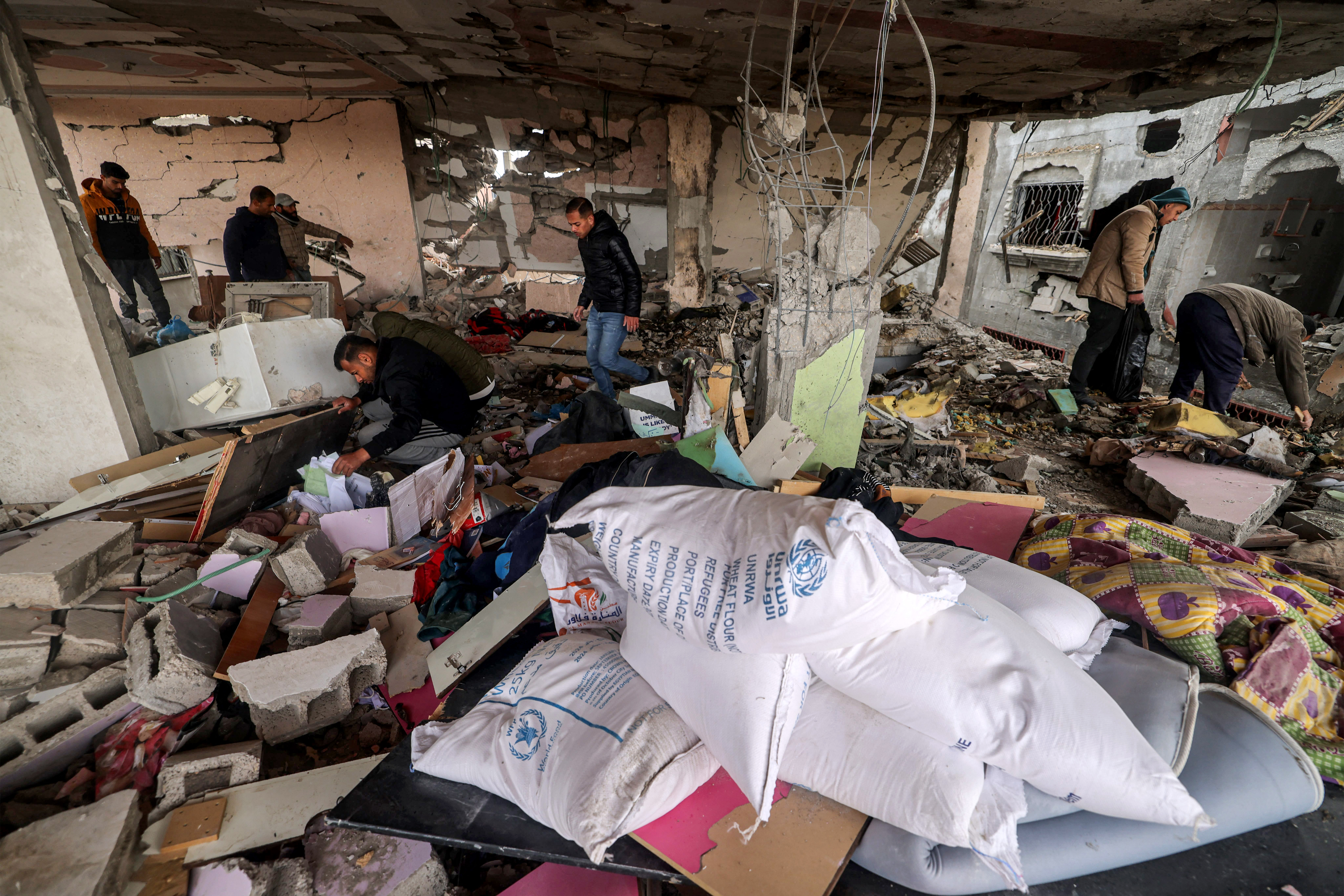 Palestinians flee the area after Israeli bombardment in central Gaza City