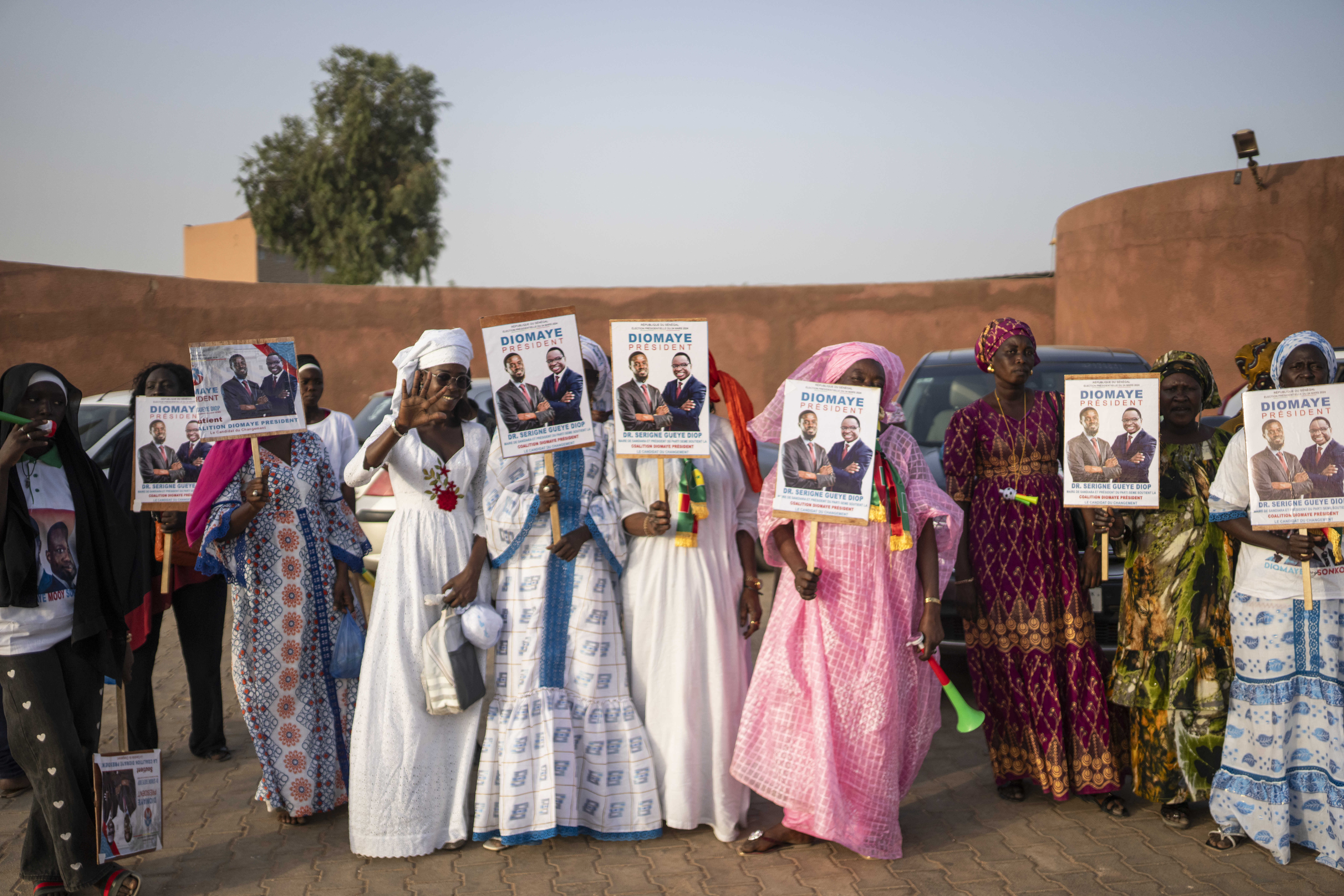 Supporters of presidential candidate Bassirou Diomaye Faye attend a final campaign rally ahead of the presidential elections in Mbour, Senegal, Friday, March 22