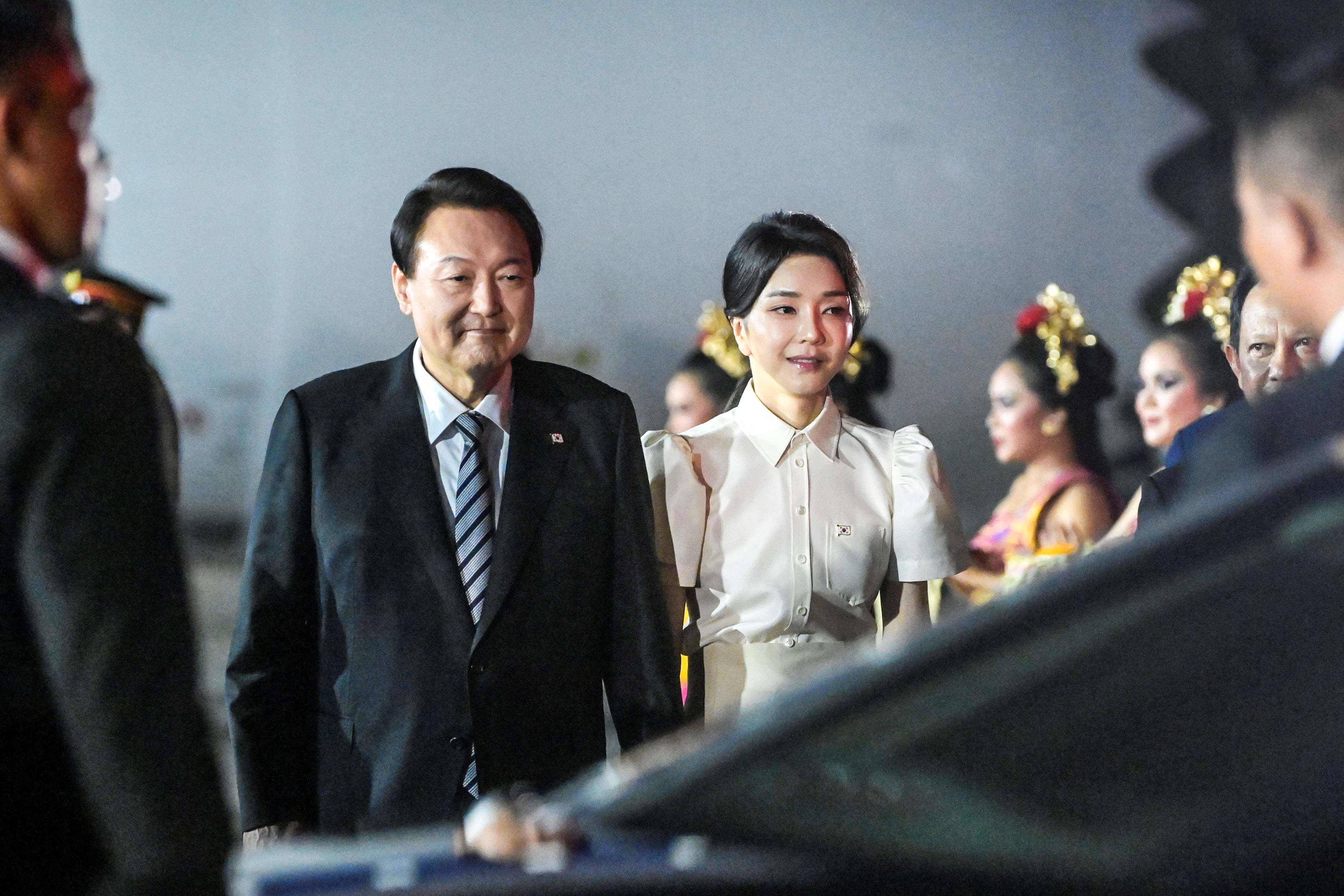 President of South Korea Yoon Suk-yeol and the first lady Kim Keon Hee arrive at the VVIP I Terminal of I Gusti Ngurah Rai Airport, Bali, Indonesia, November 13, 2022