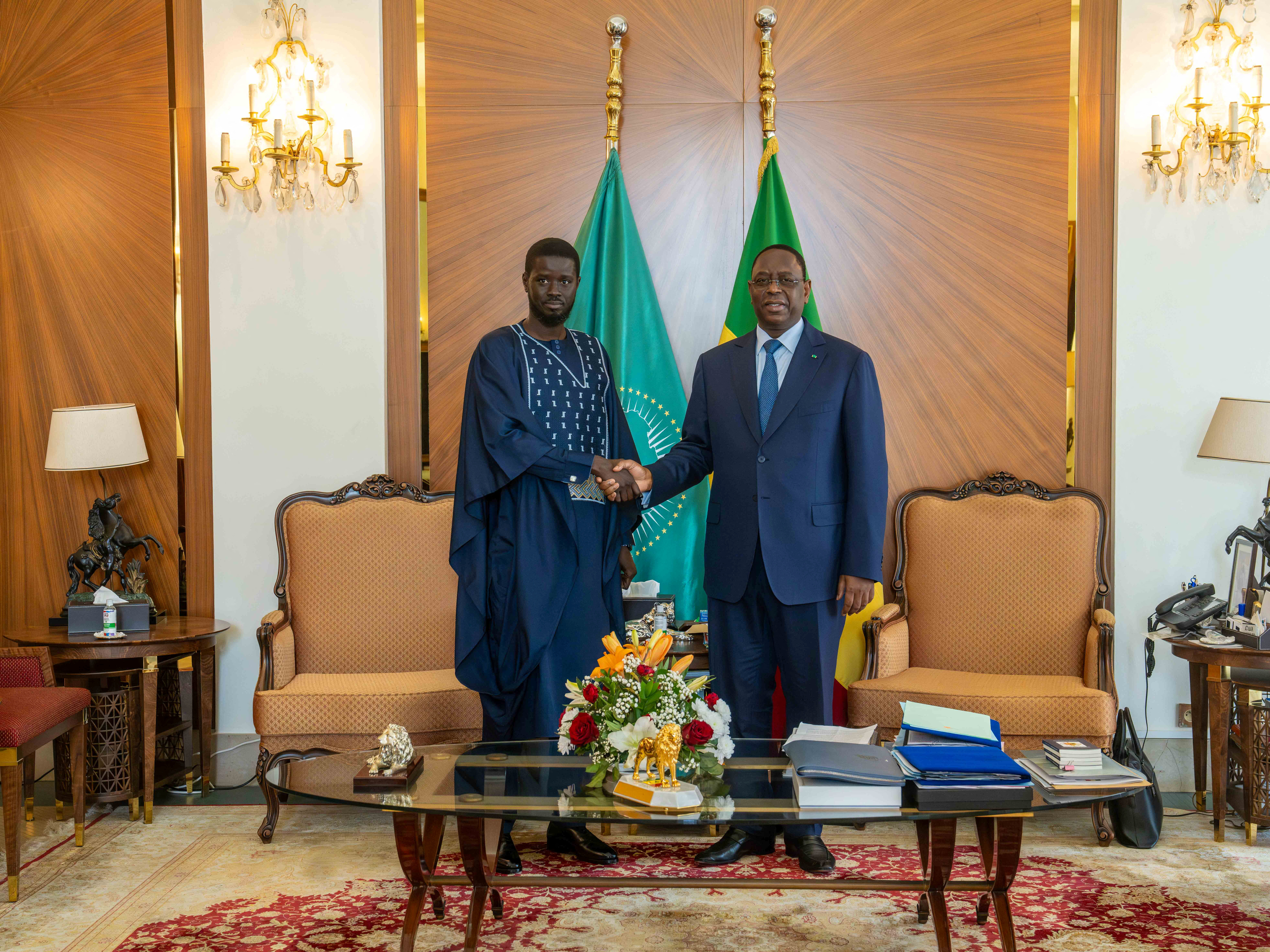 Senegal's President-elect Bassirou Diomaye Faye meets outgoing President Macky Sall at the presidential palace in Dakar