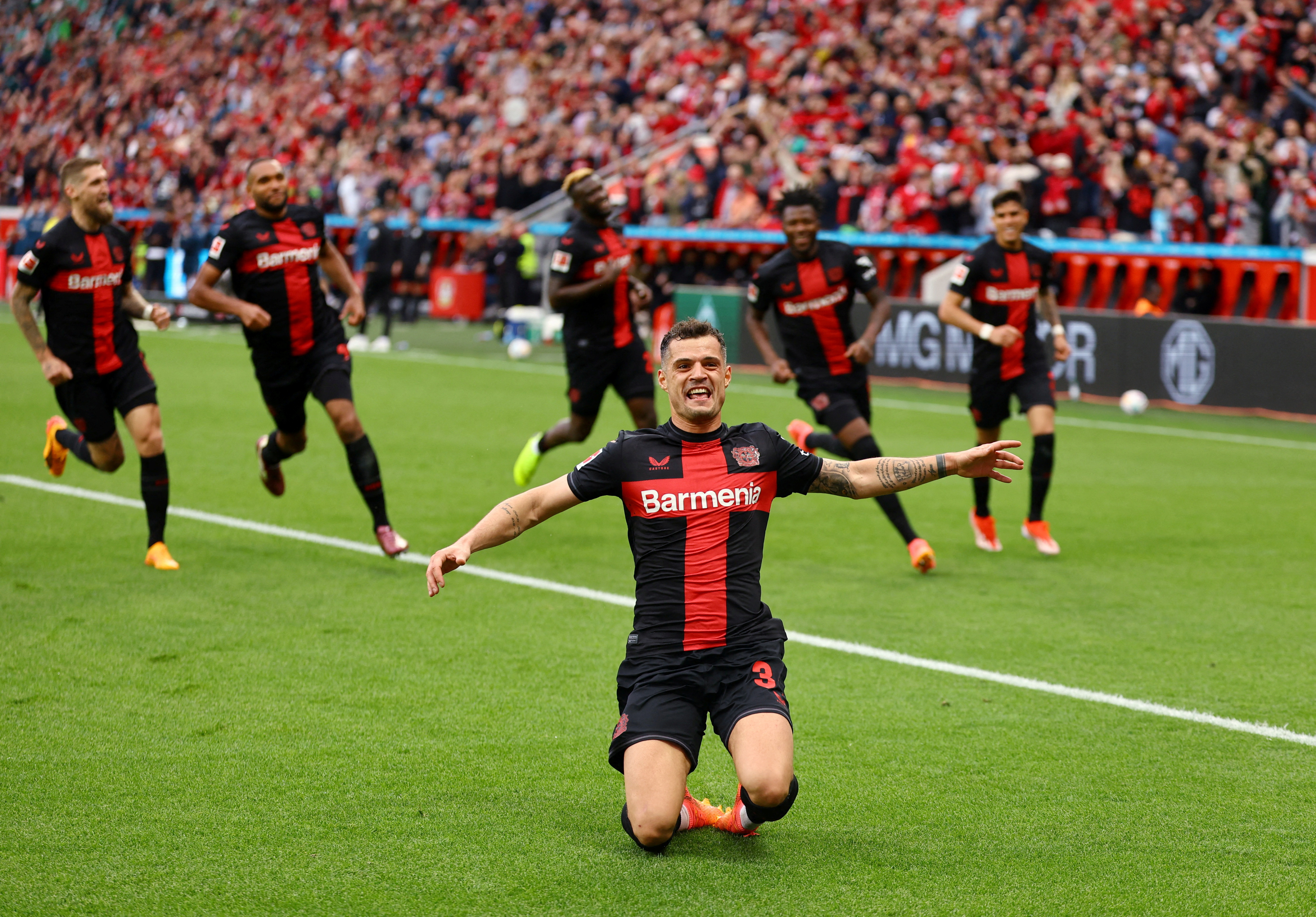 Leverkusen's Granit Xhaka celebrates scoring
