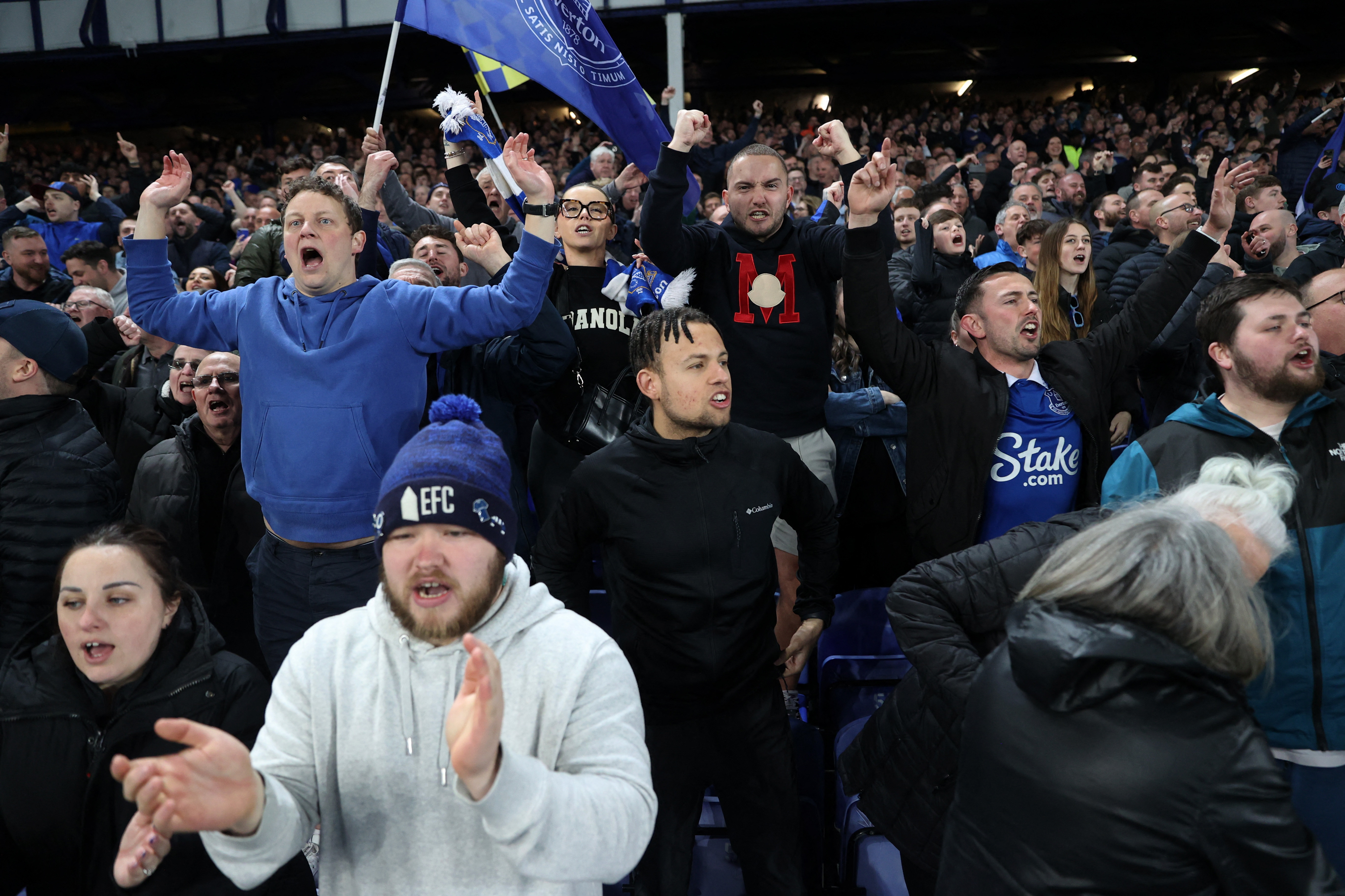 Soccer Football - Premier League - Everton v Liverpool - Goodison Park, Liverpool, Britain - April 24, 2024 Everton fans celebrate REUTERS/Carl Recine NO USE WITH UNAUTHORIZED AUDIO, VIDEO, DATA, FIXTURE LISTS, CLUB/LEAGUE LOGOS OR 'LIVE' SERVICES. ONLINE IN-MATCH USE LIMITED TO 45 IMAGES, NO VIDEO EMULATION. NO USE IN BETTING, GAMES OR SINGLE CLUB/LEAGUE/PLAYER PUBLICATIONS.