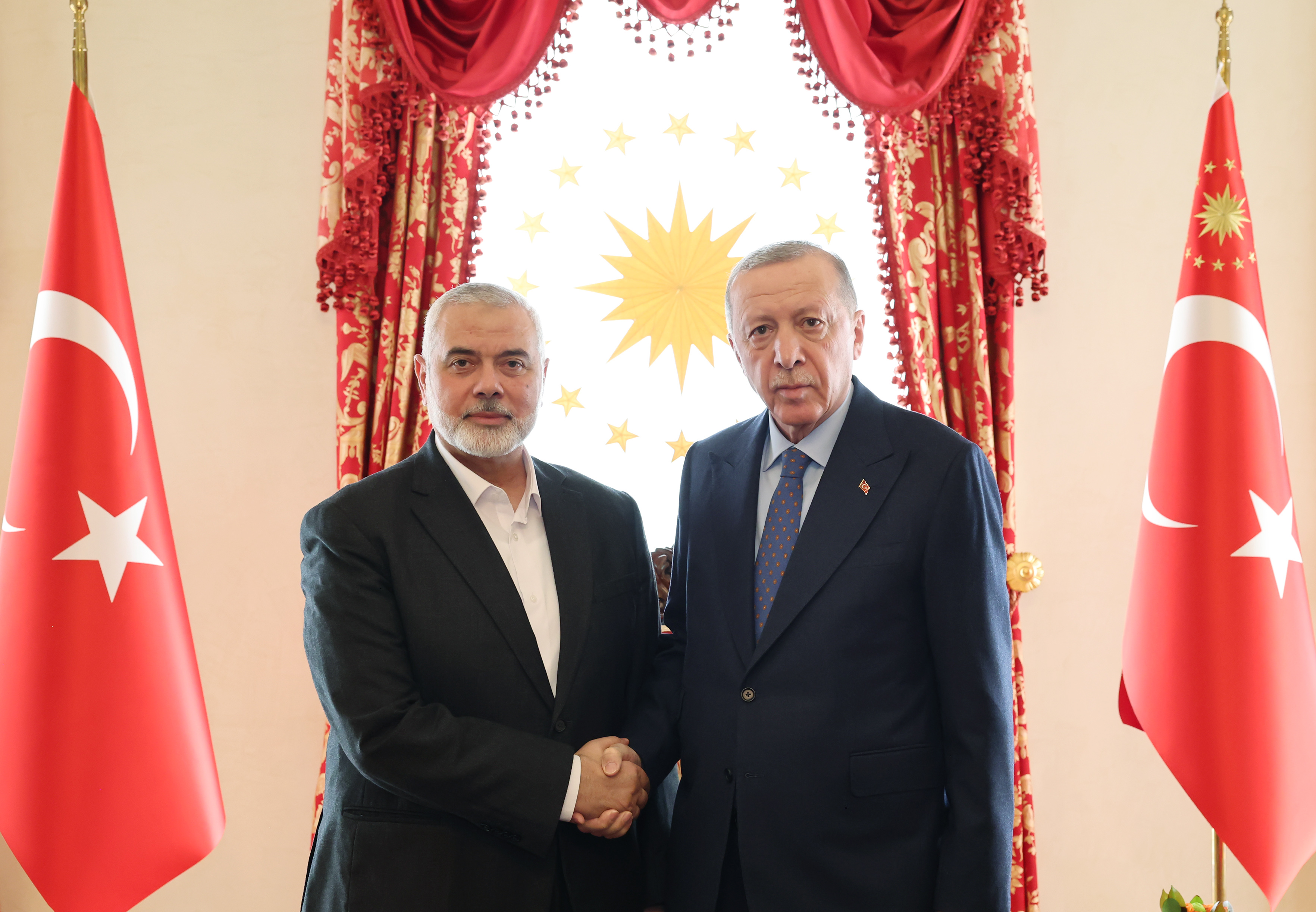 Turkish President Recep Tayyip Erdogan (R) meets with Hamas Political Bureau Chairman Ismail Haniyeh at Dolmabahce Palace working office in Istanbul, Turkiye on April 20