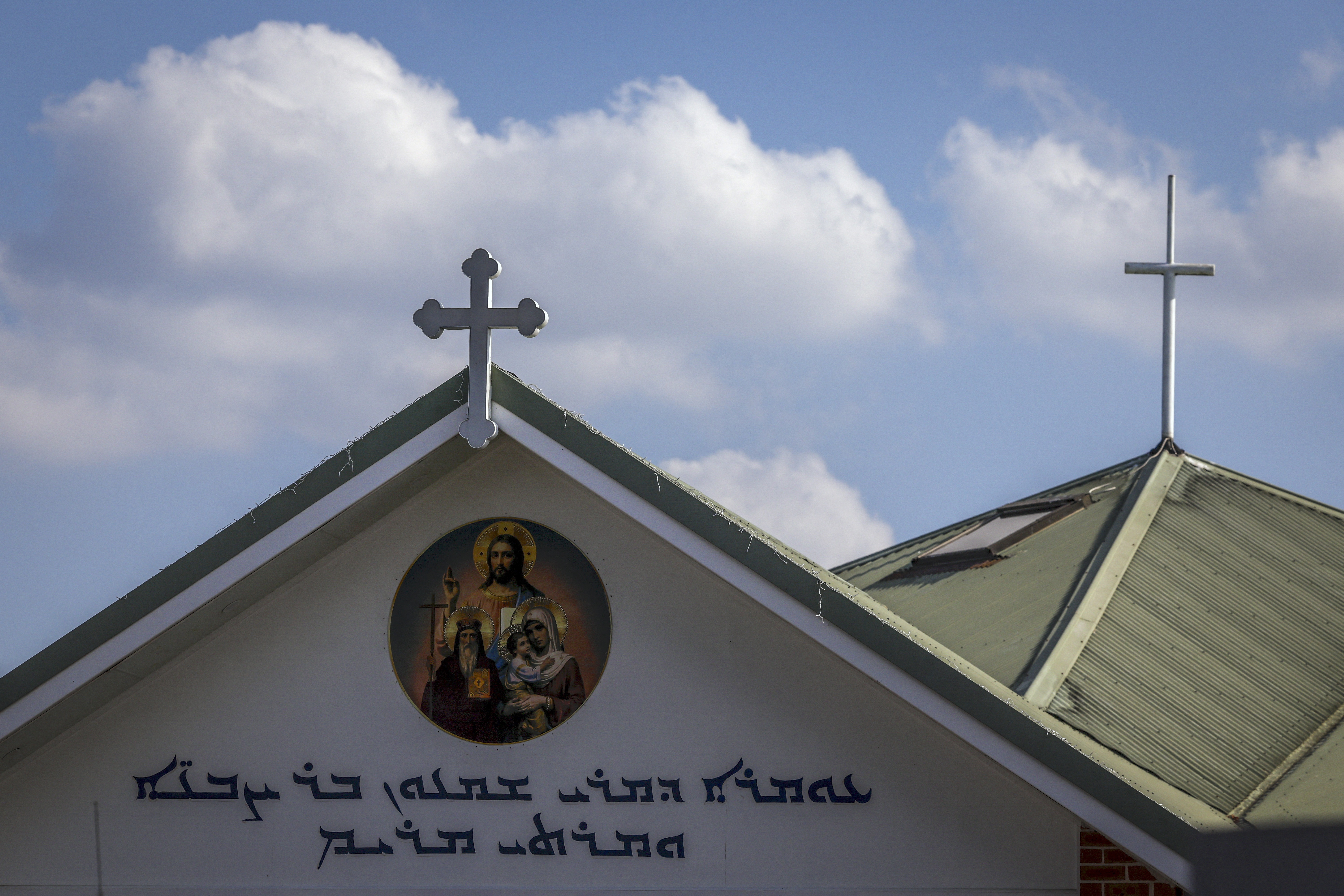 Crosses adorn the roof of the Christ the Good Shepherd Church in western Sydney