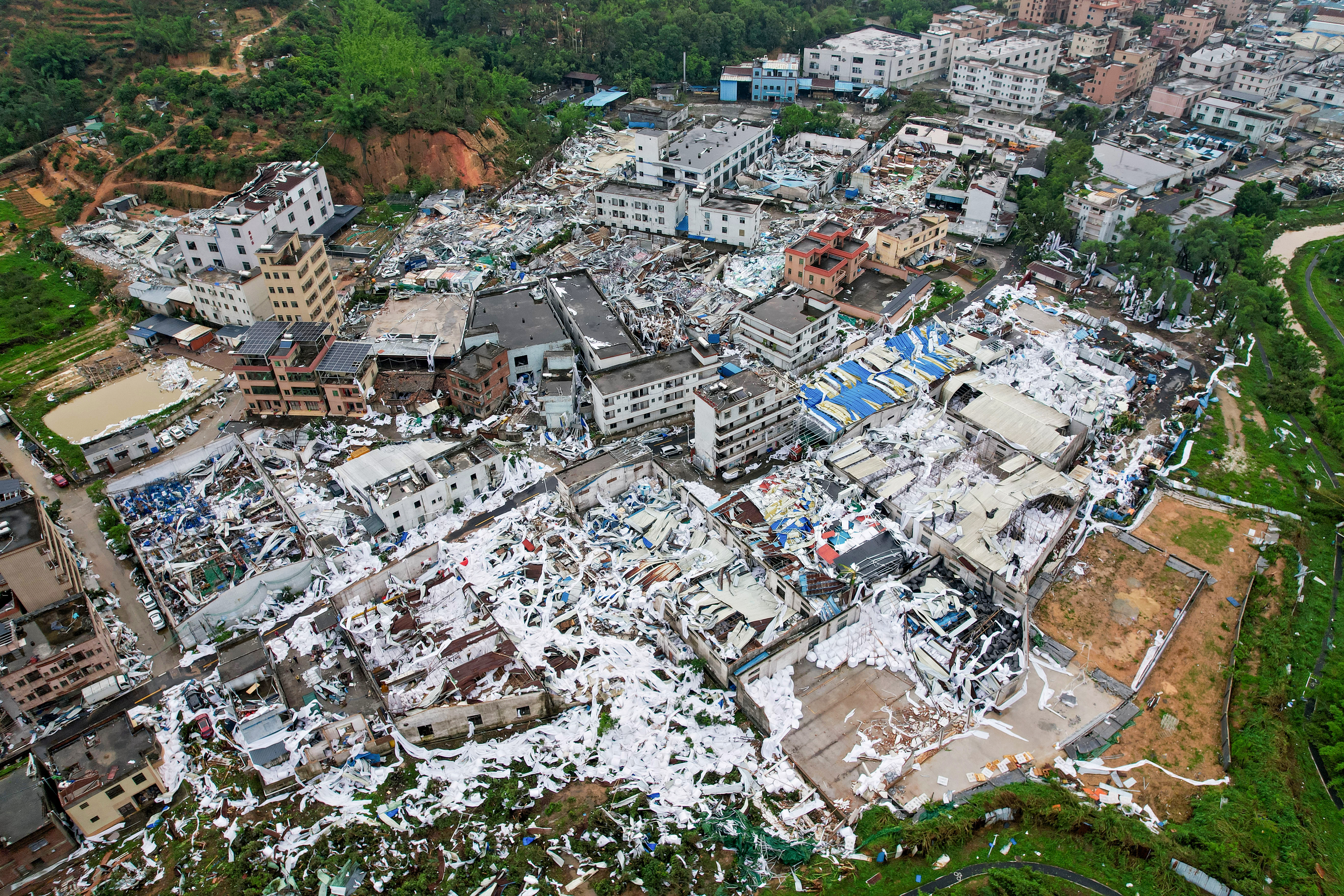 A destroyed area of Guangzhou. The buildings along its path have been flattened.