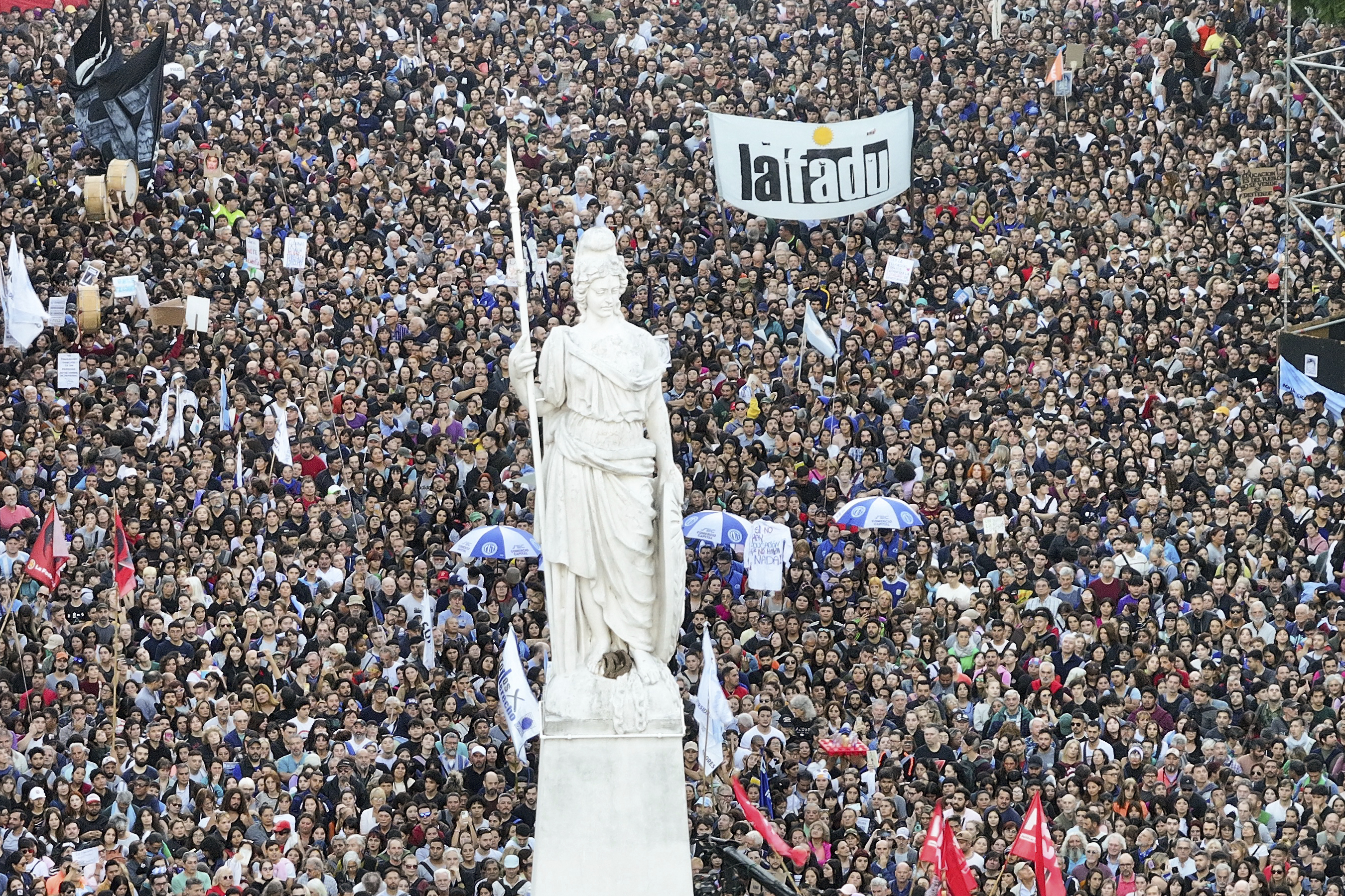Demonstrators gather outside the Casa Rosada presidential palace during a march demanding more funding for public universities and to protest against austerity measures proposed by President Javier Milei, in Buenos Aires, Argentina, April 23