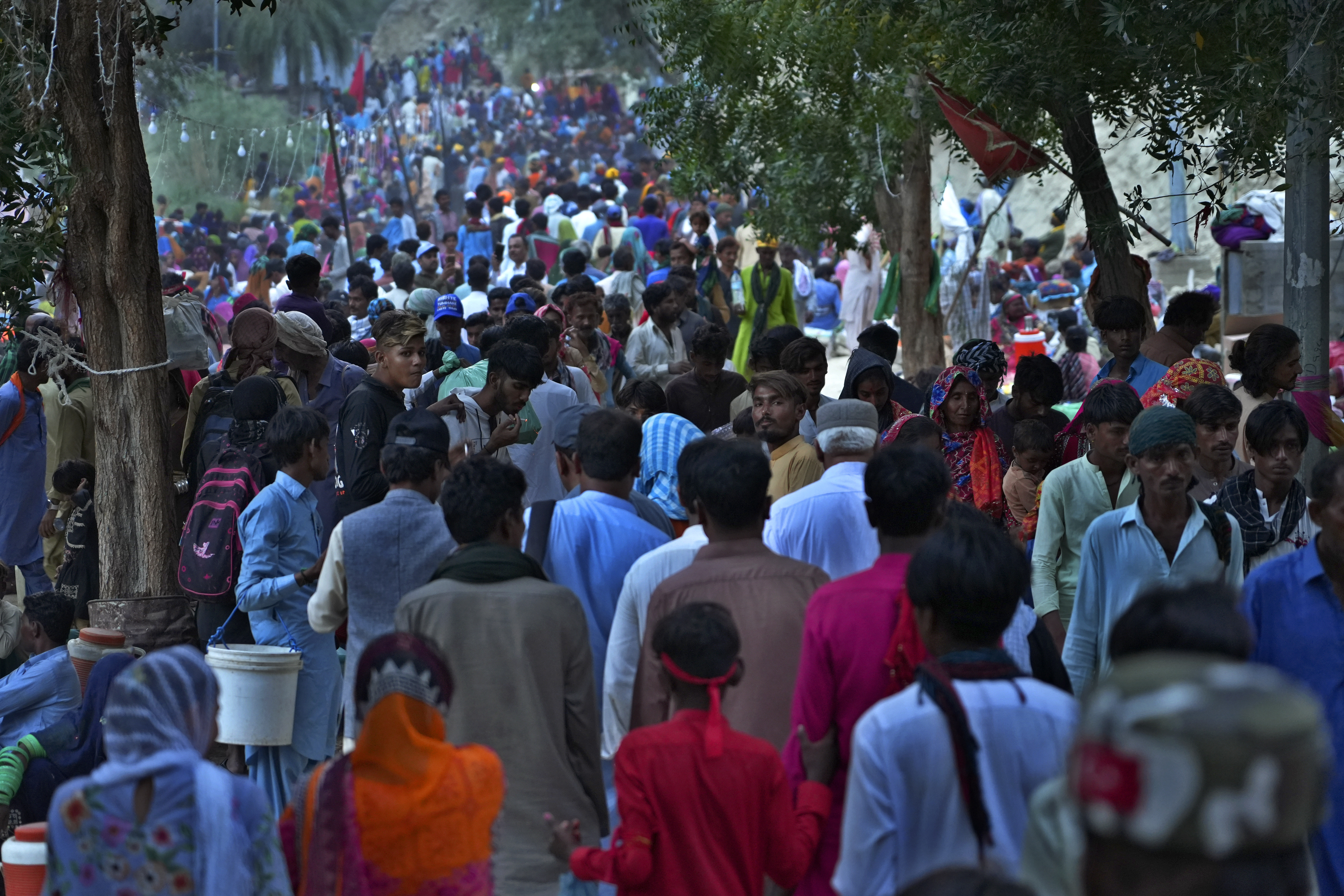 Hindu devotees arrive at an ancient cave temple of Hinglaj Mata to attend an annual festival in Hinglaj in Lasbela district in Pakistan's southwestern Baluchistan province, Friday, April 26