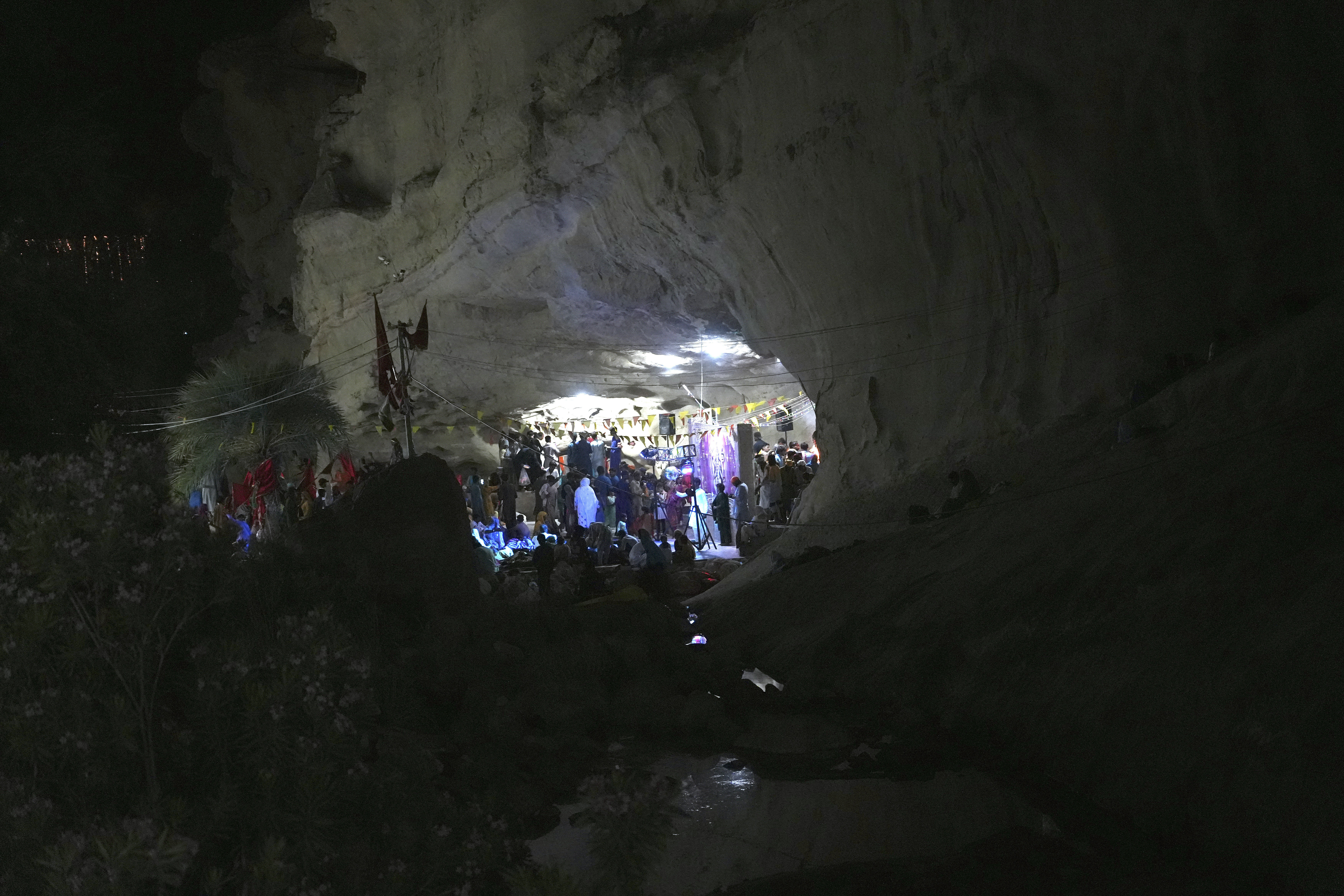 Hindu devotees attend an annual festival in an ancient cave temple of Hinglaj Mata in Hinglaj in Lasbela district in Pakistan's southwestern Baluchistan province, Friday, April 26